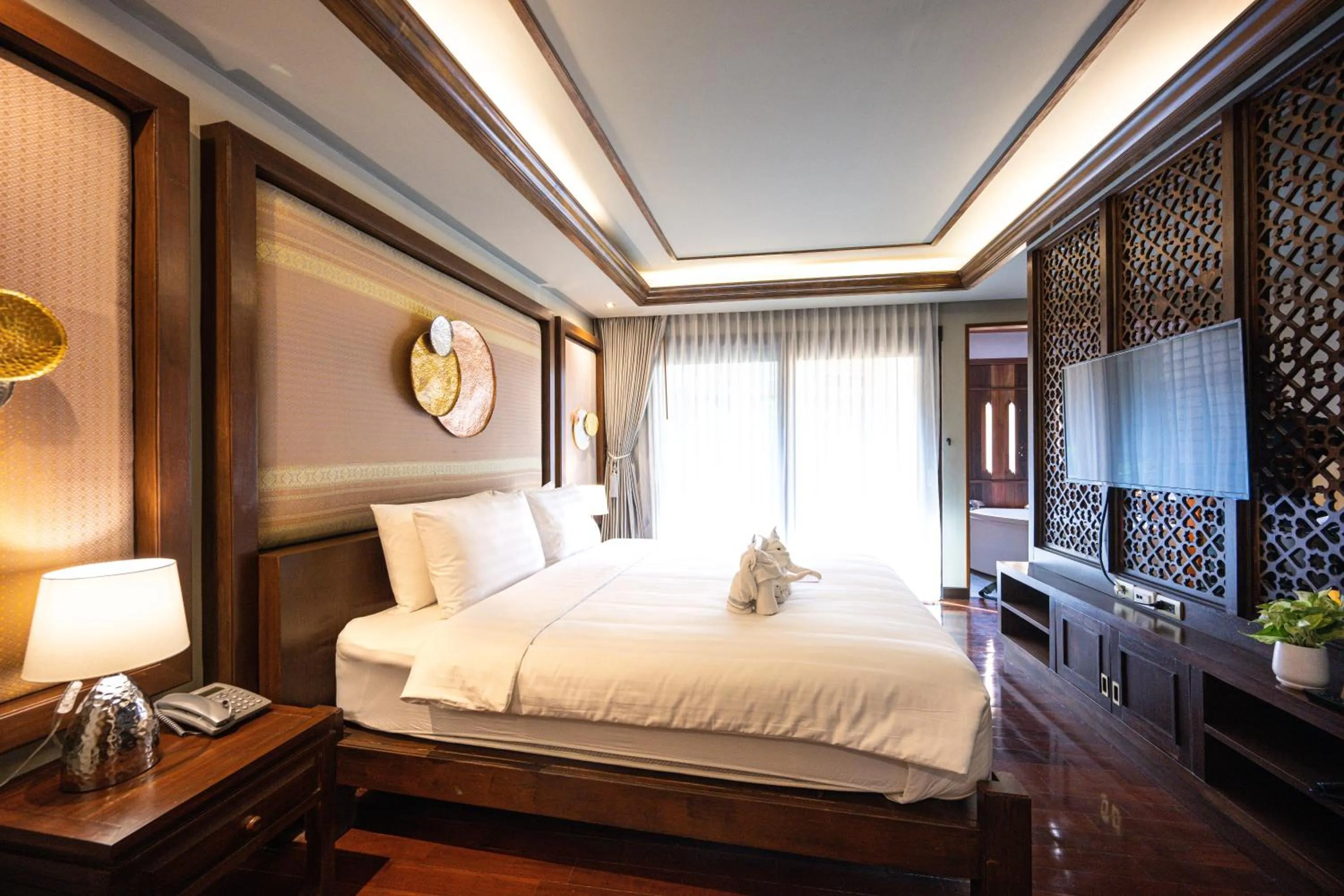 Bed in At Gate Thaphae Hotel