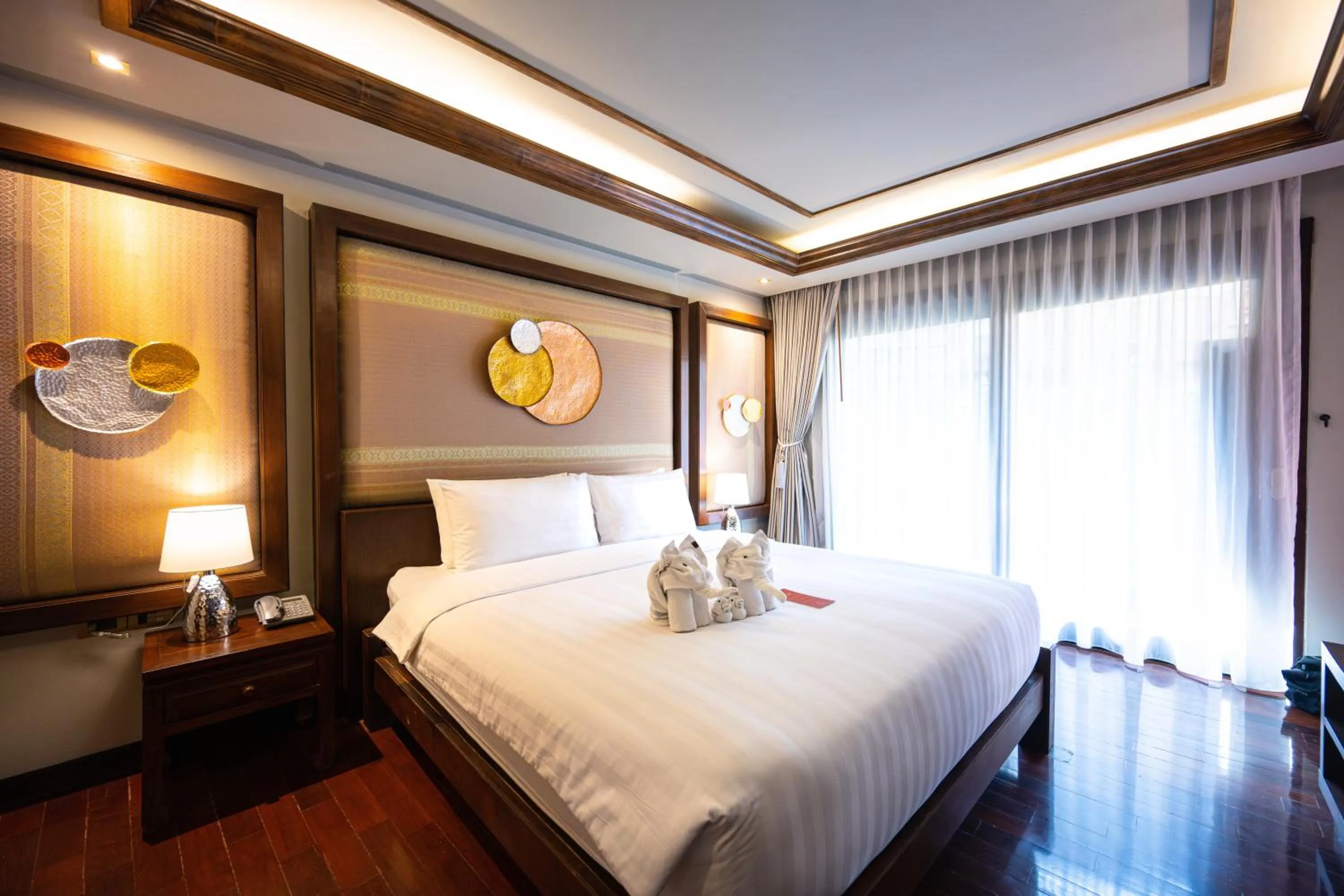 Bed in At Gate Thaphae Hotel