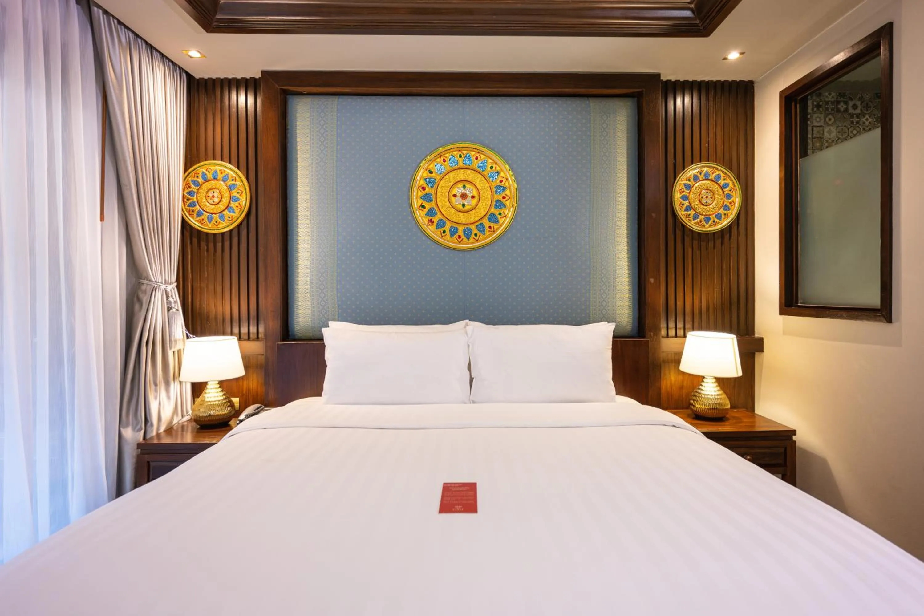 Bed in At Gate Thaphae Hotel