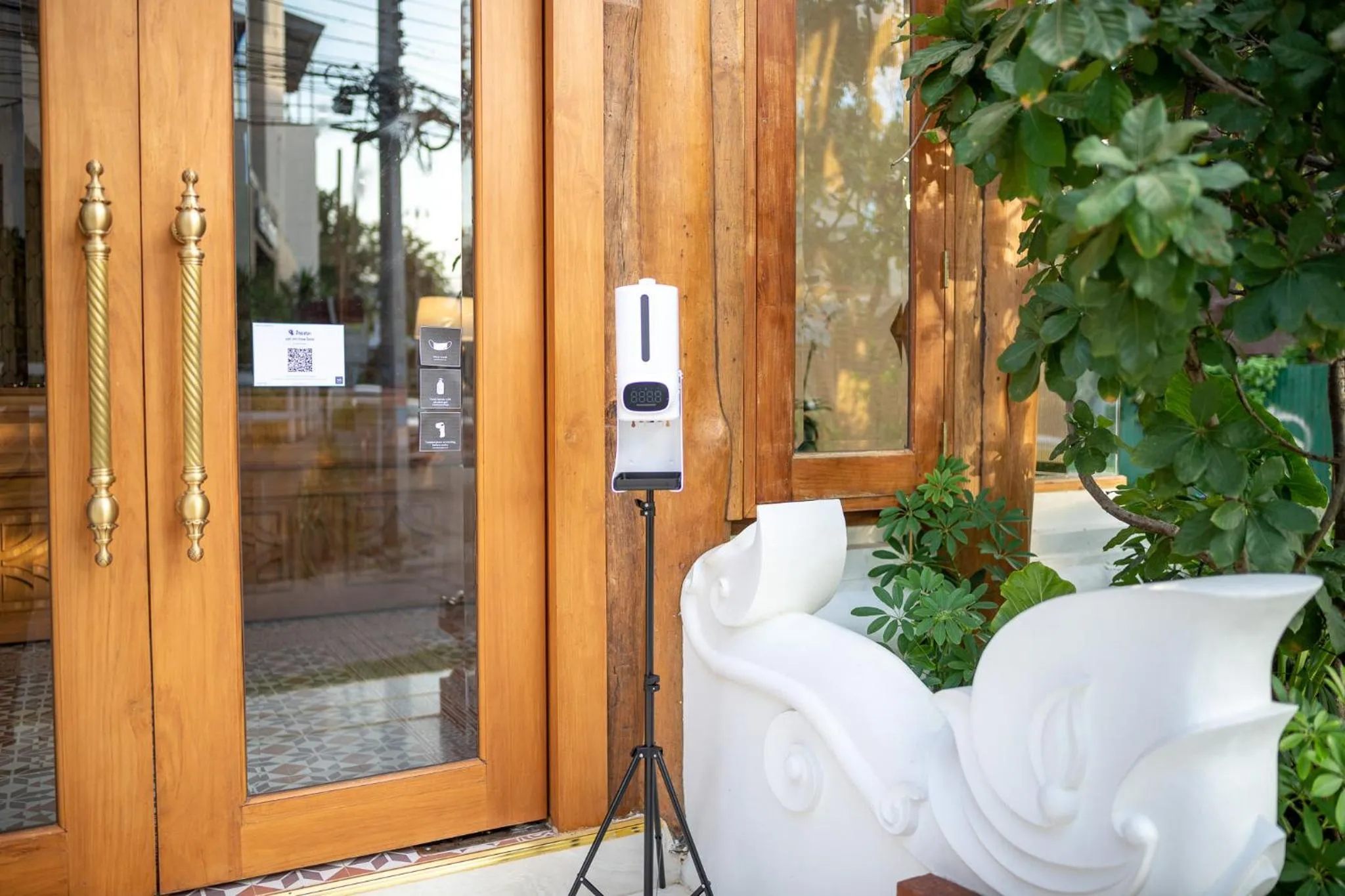 Property logo or sign in At Gate Thaphae Hotel