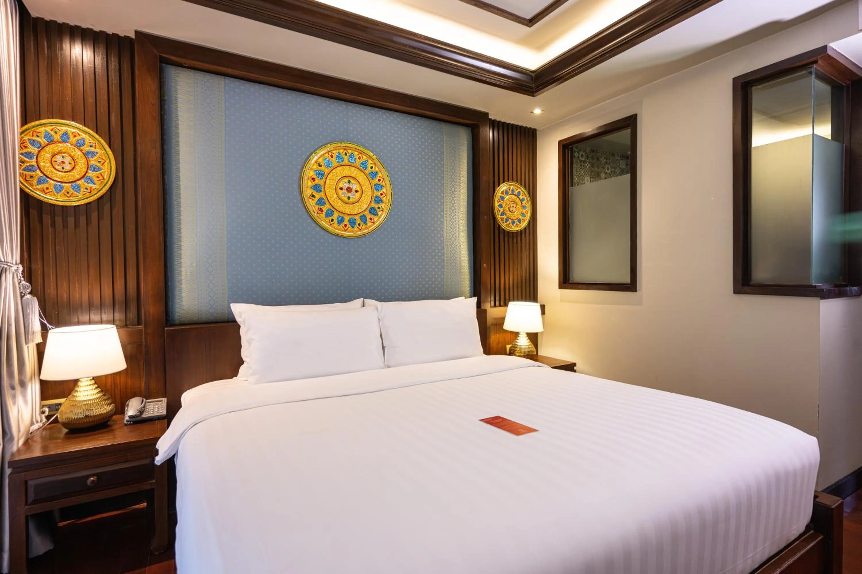 Bed in At Gate Thaphae Hotel