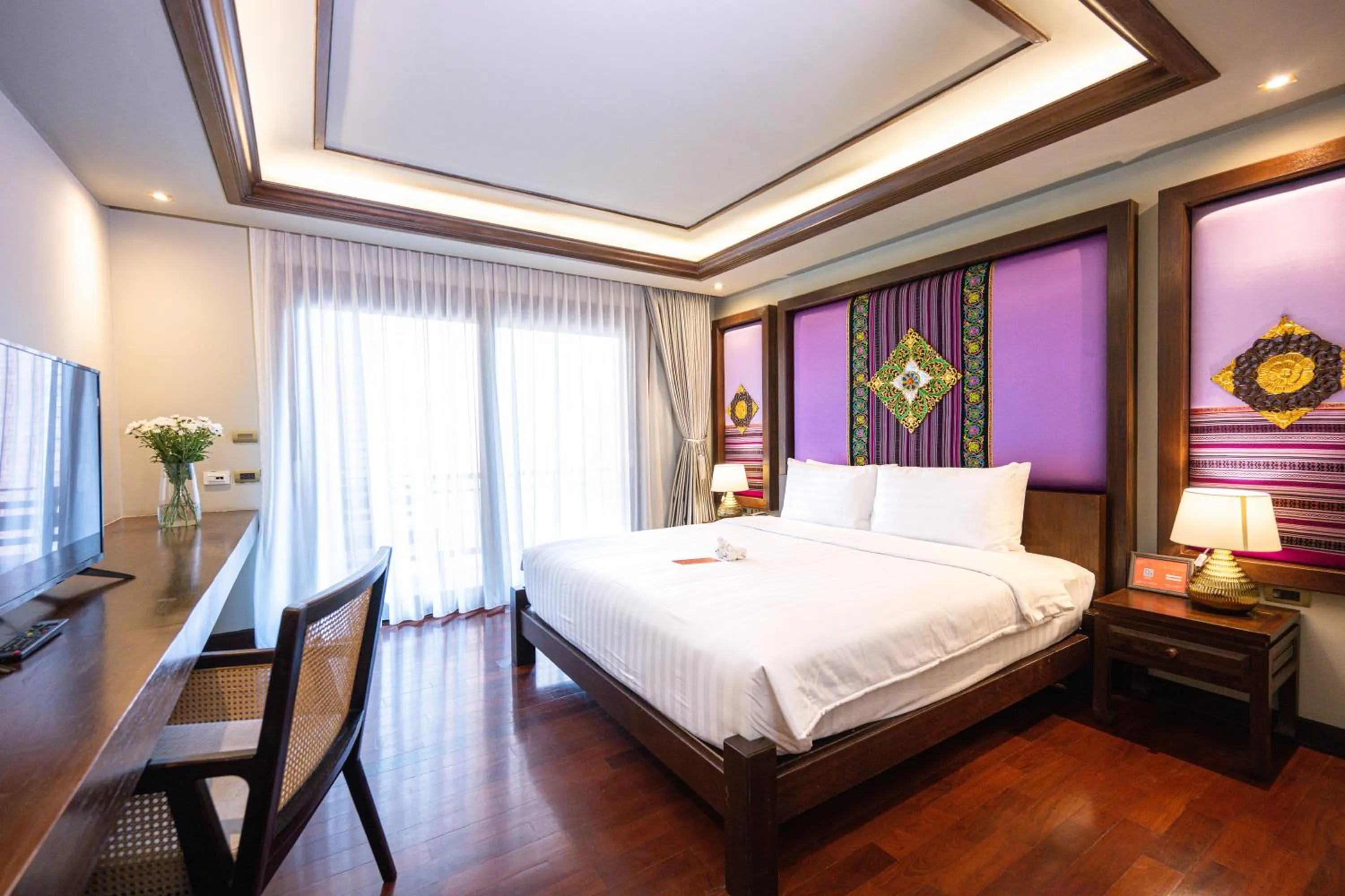 Bed in At Gate Thaphae Hotel