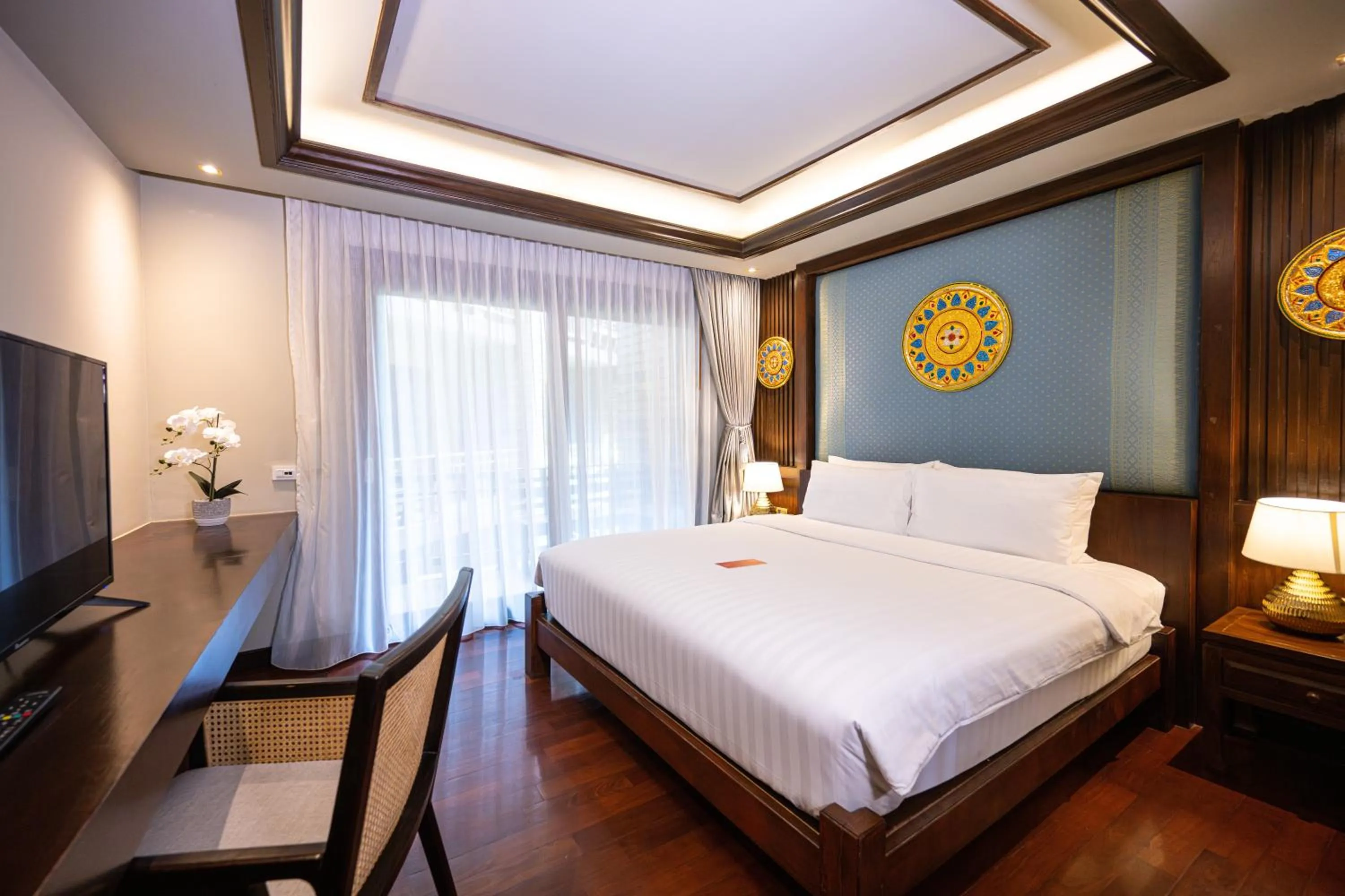 Bed in At Gate Thaphae Hotel