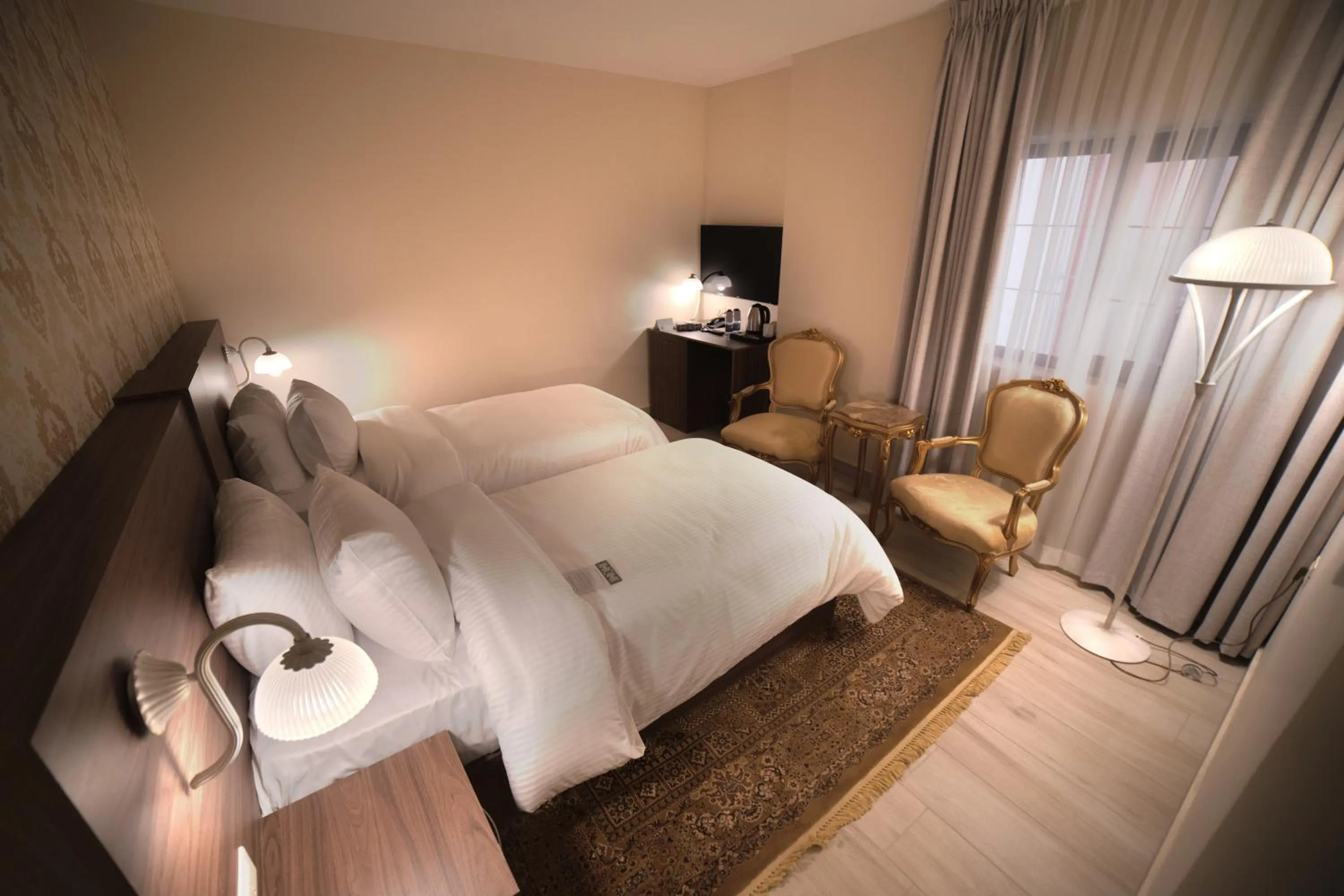 Bed in Khan Khediwe Hotel