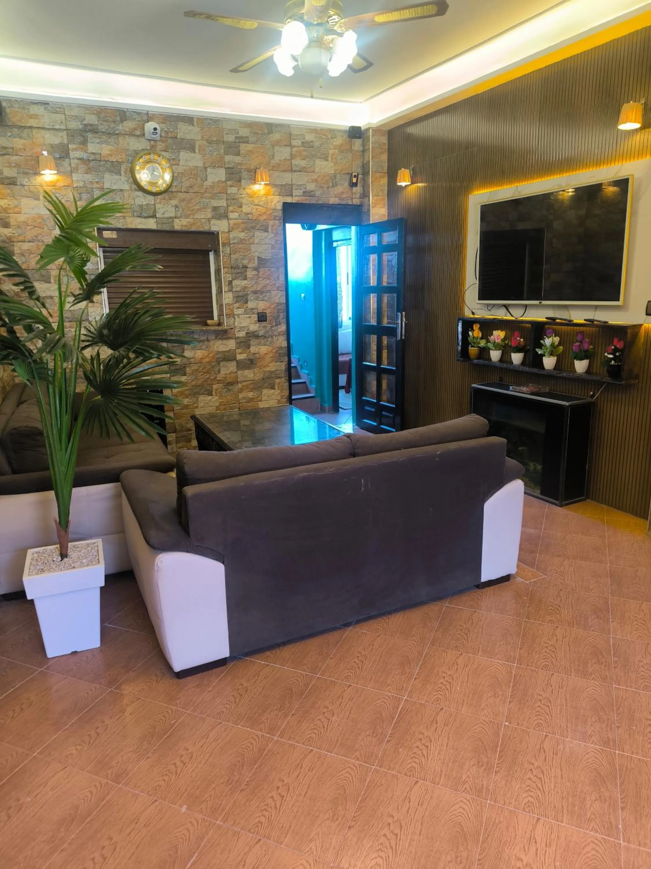 Communal lounge/ TV room in Jad Auberge