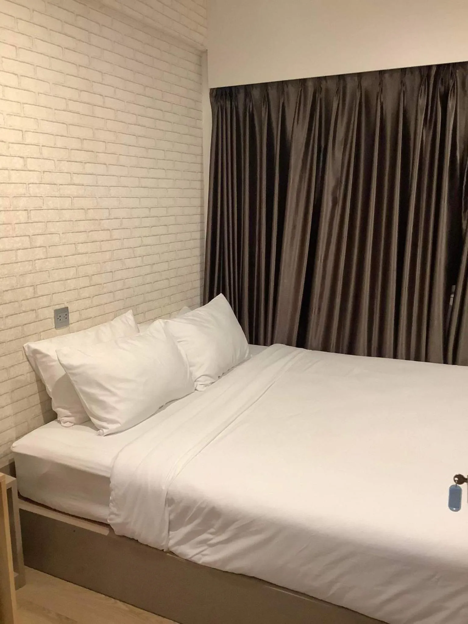 Bed in CR.HOTEL