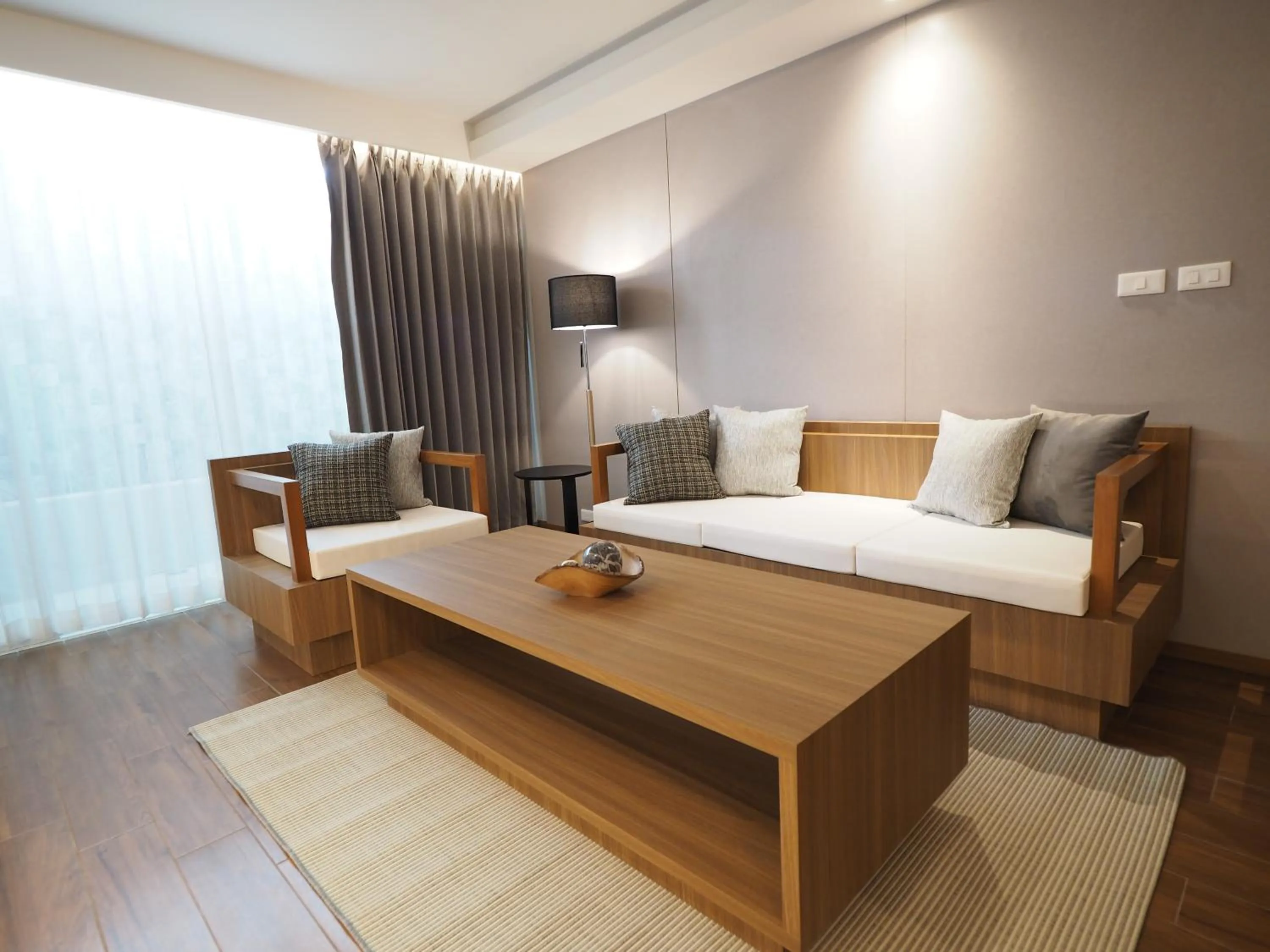 Living room, Bed in Shambhala Hotel Pattaya