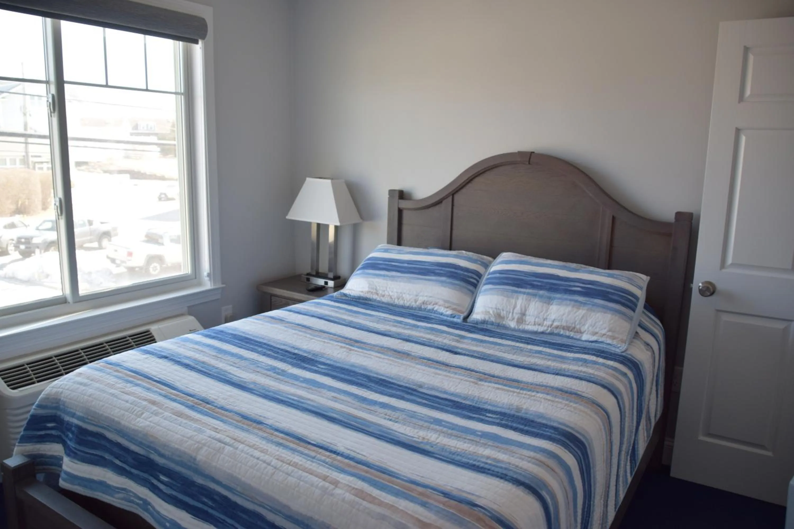 Bed in Rhea's Inn by the Sea