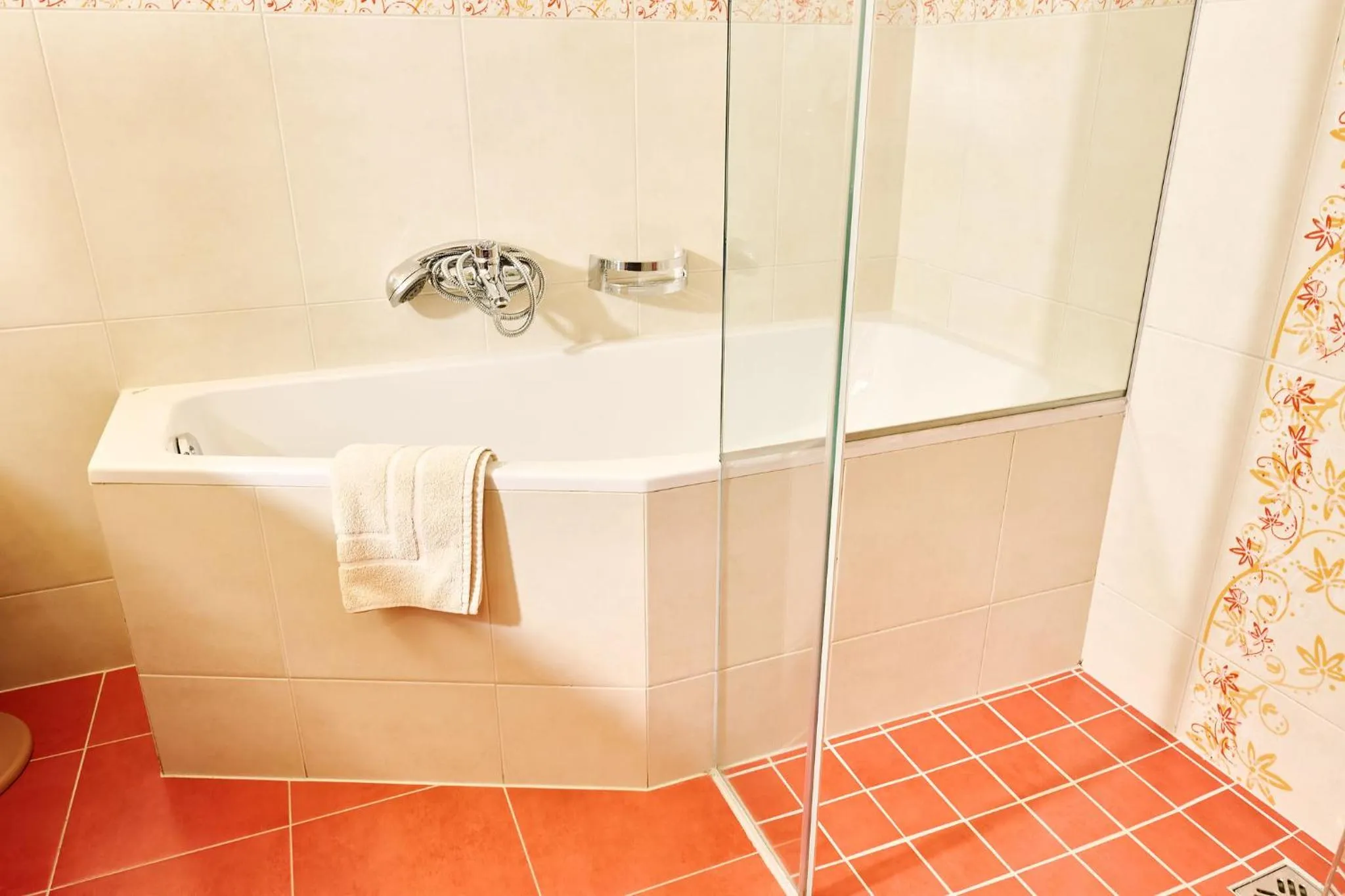 Bathroom in Thermenwelt Hotel Pulverer