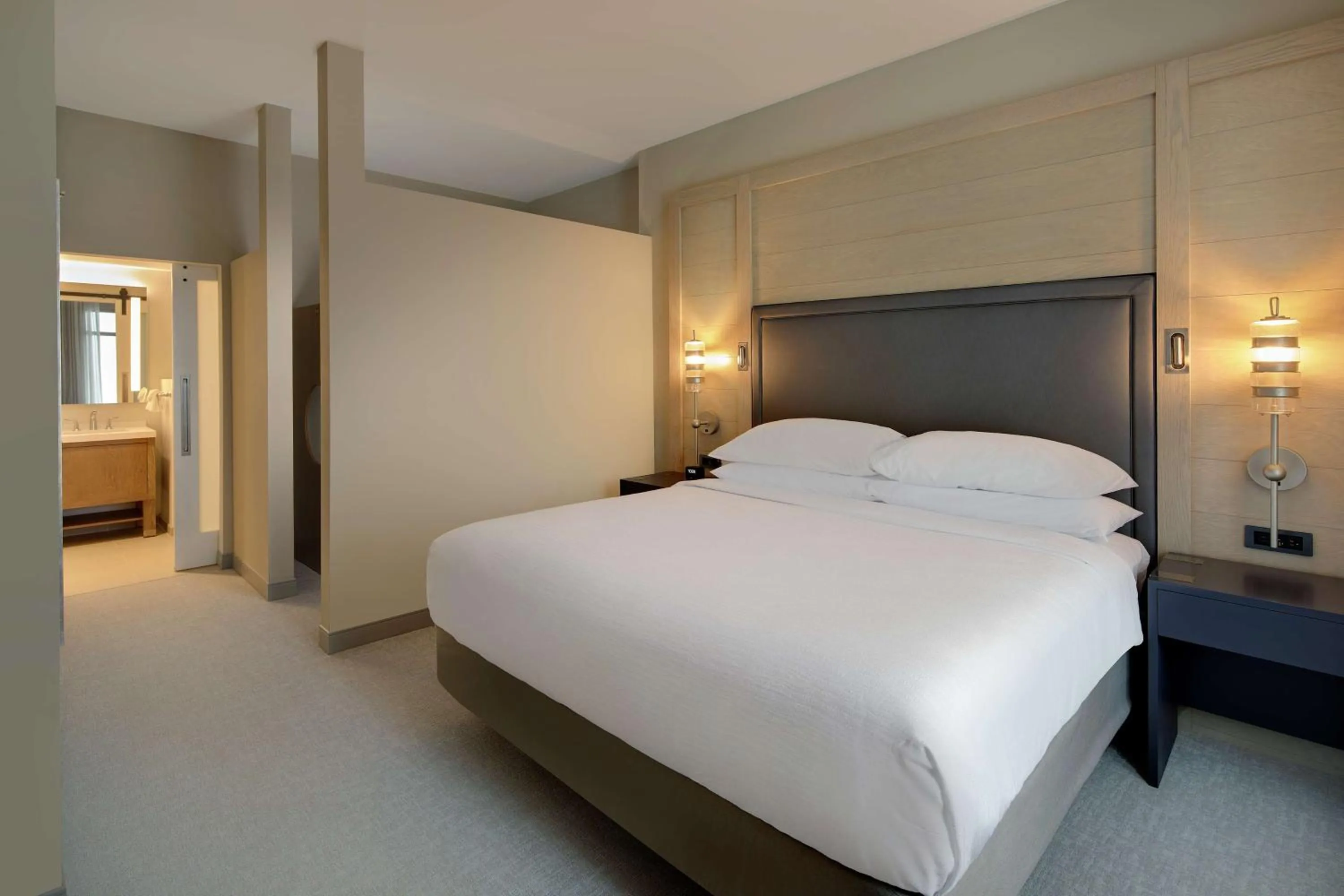 Photo of the whole room, Bed in Embassy Suites St Augustine Beach Oceanfront Resort