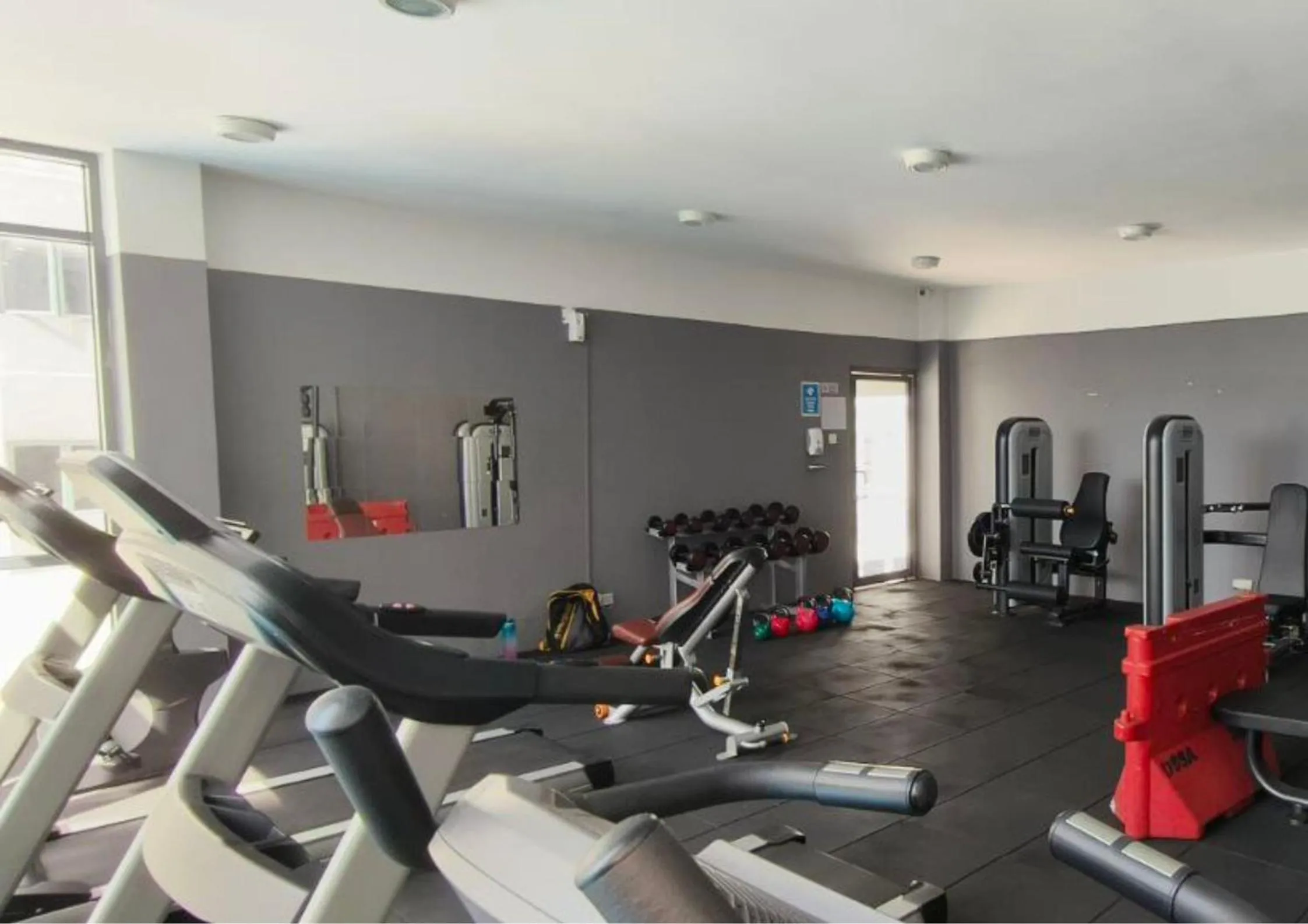 Fitness centre/facilities in Cozy Park View Stay Above DPulze Mall #DP1