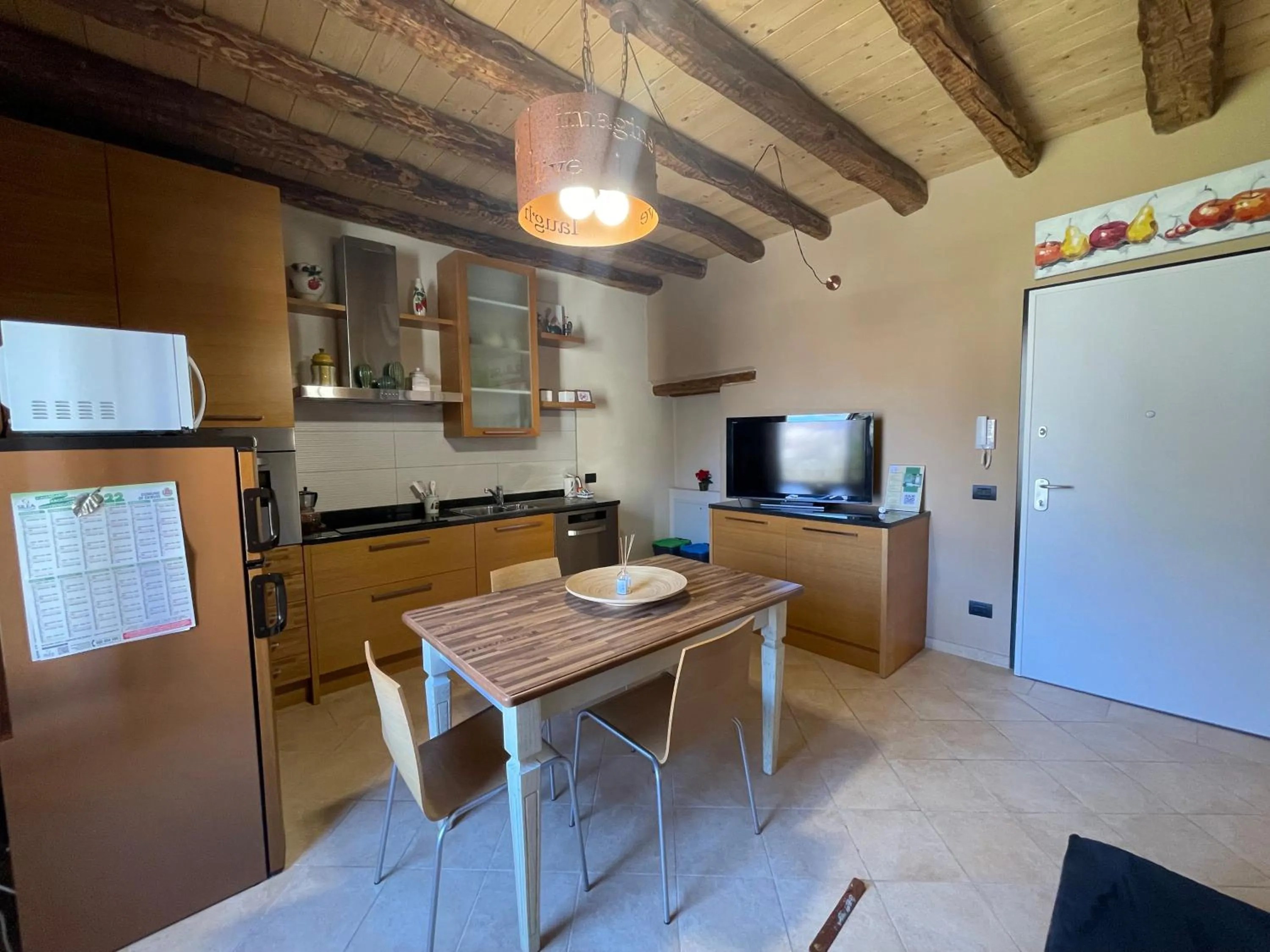 Kitchen or kitchenette in La Casa Sul Sasso In town serviced accommodations
