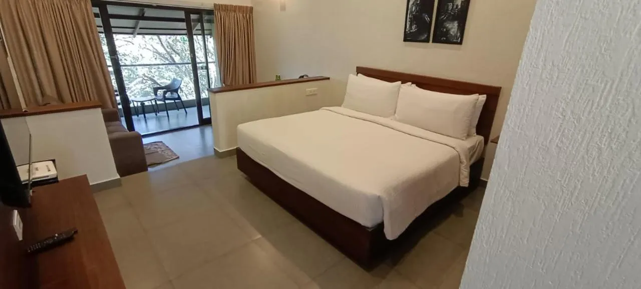 Coffee/tea facilities, Bed in Tea Terrain Resorts & Spa