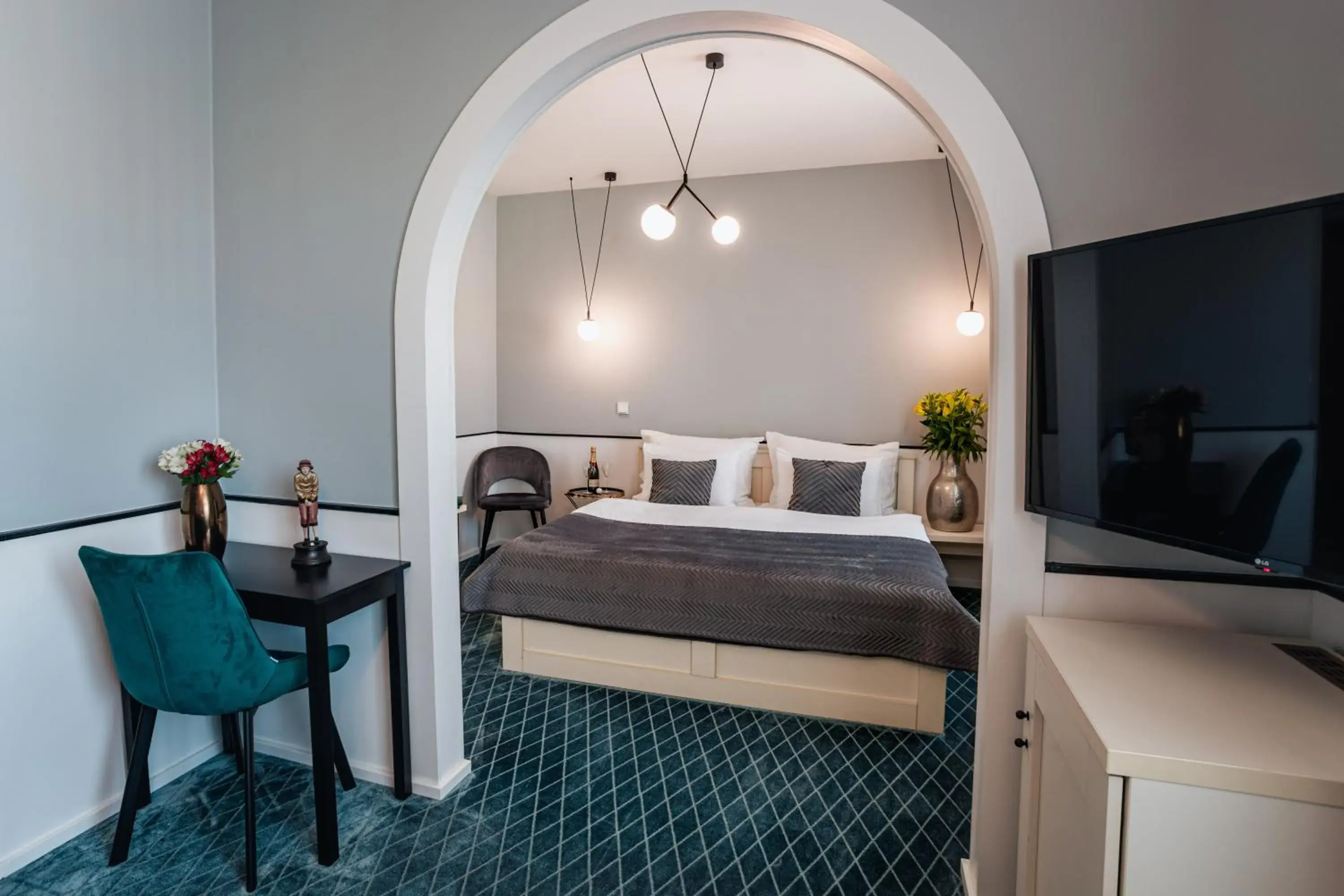 Deluxe Double Room with Extra Bed in Hotel Golfi Deluxe Double Room with Extra Bed in Hotel Golfi