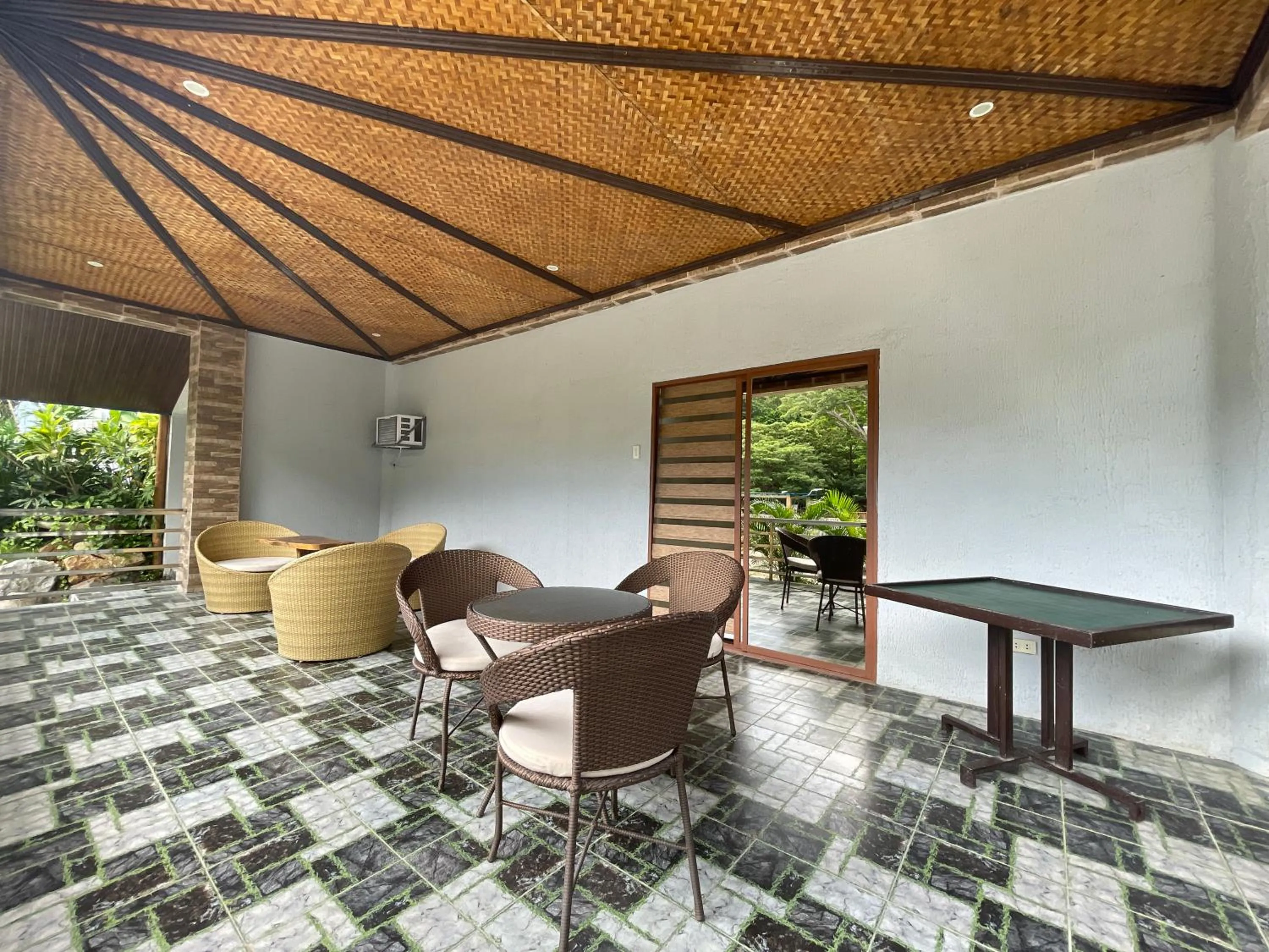 Seating area in LaSersita Casitas and Water Spa Beach Resort by Cocotel