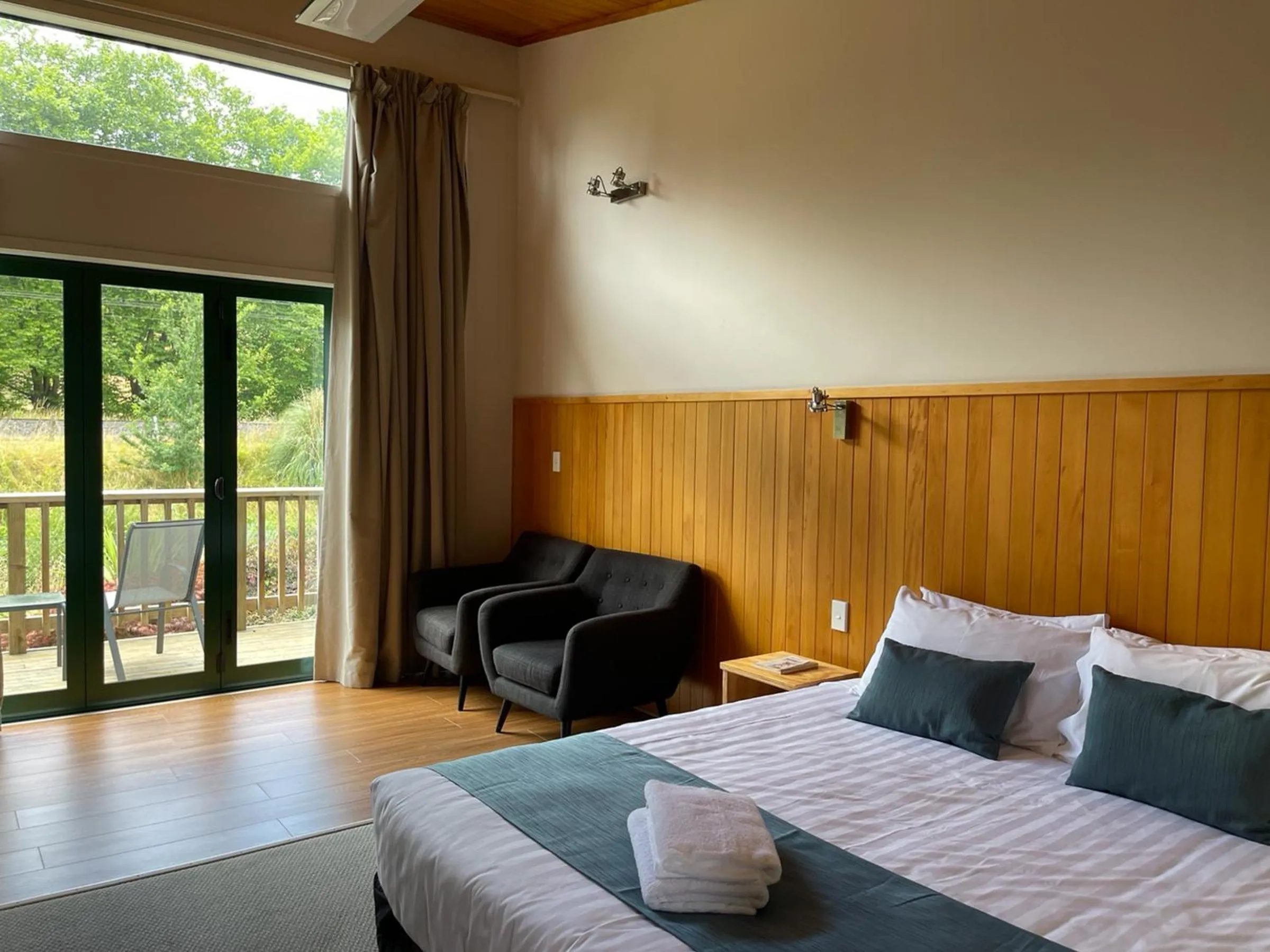 Bed in Waitomo Lodge