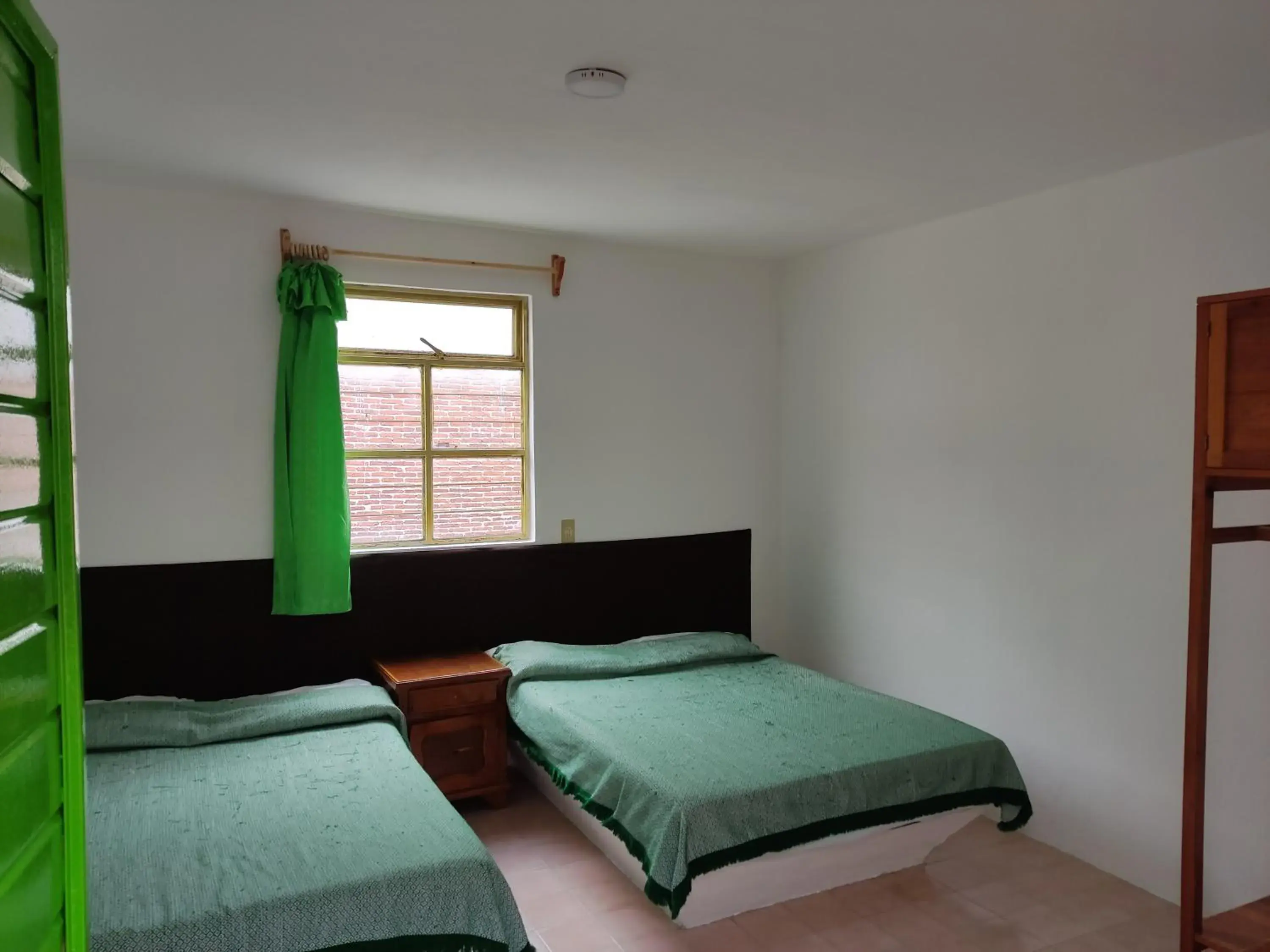 Deluxe Double Room with Two Double Beds in Hotel Tivoli Deluxe Double Room with Two Double Beds in Hotel Tivoli