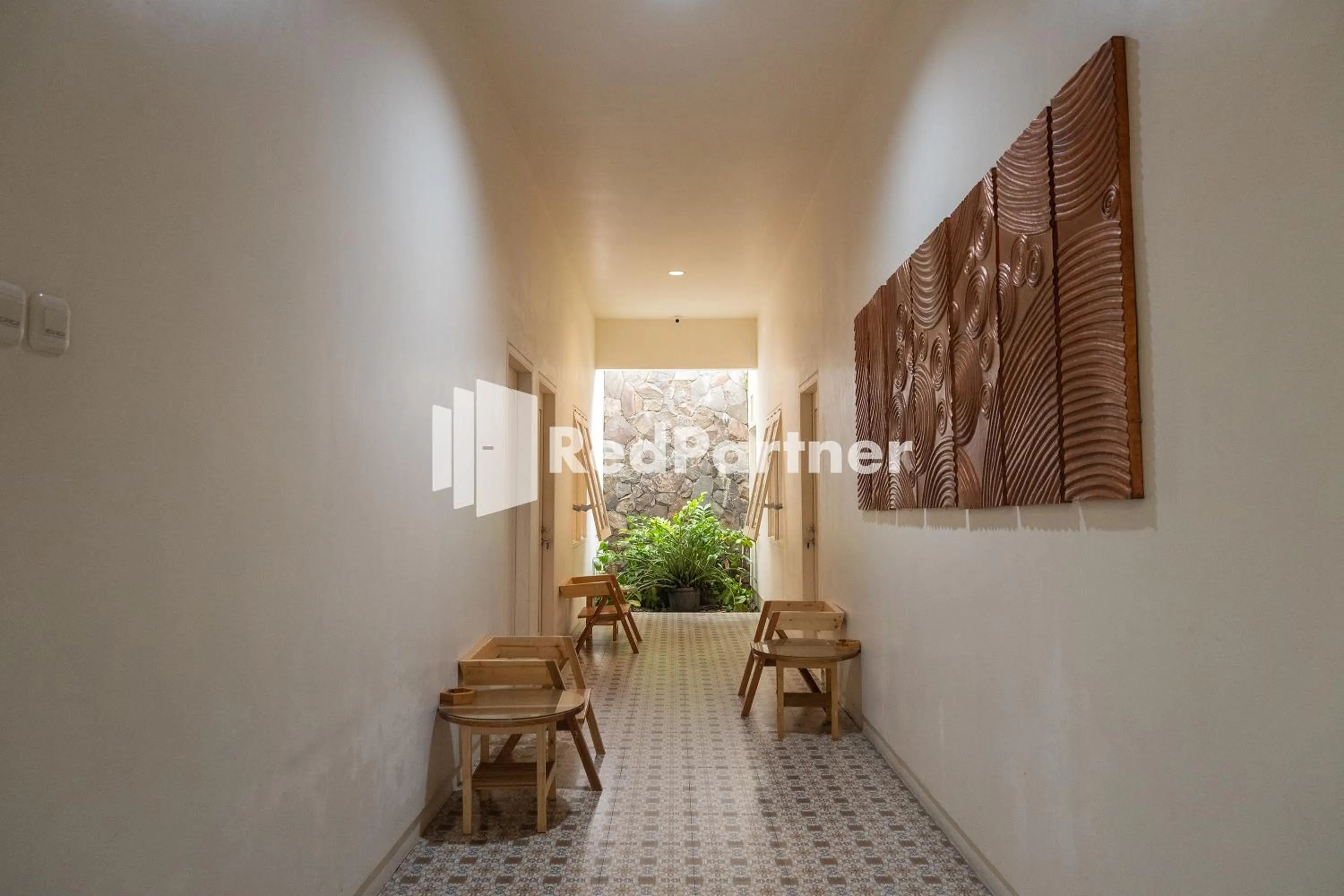 Seating area in Villa Dora Jogja near Malioboro Area Mitra RedDoorz