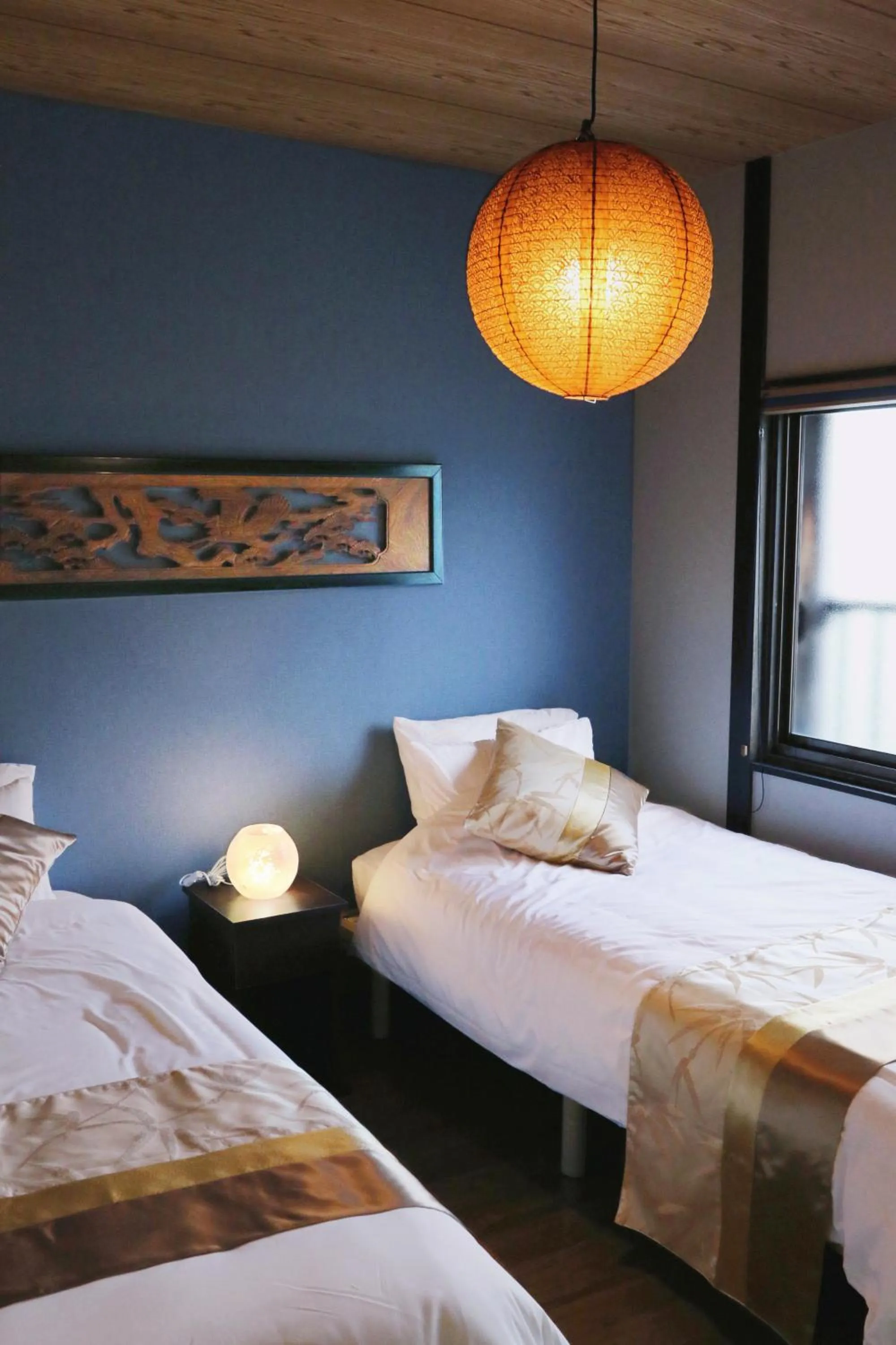 Bed in MON Kishinosato Sakura Resort -vacation rental-