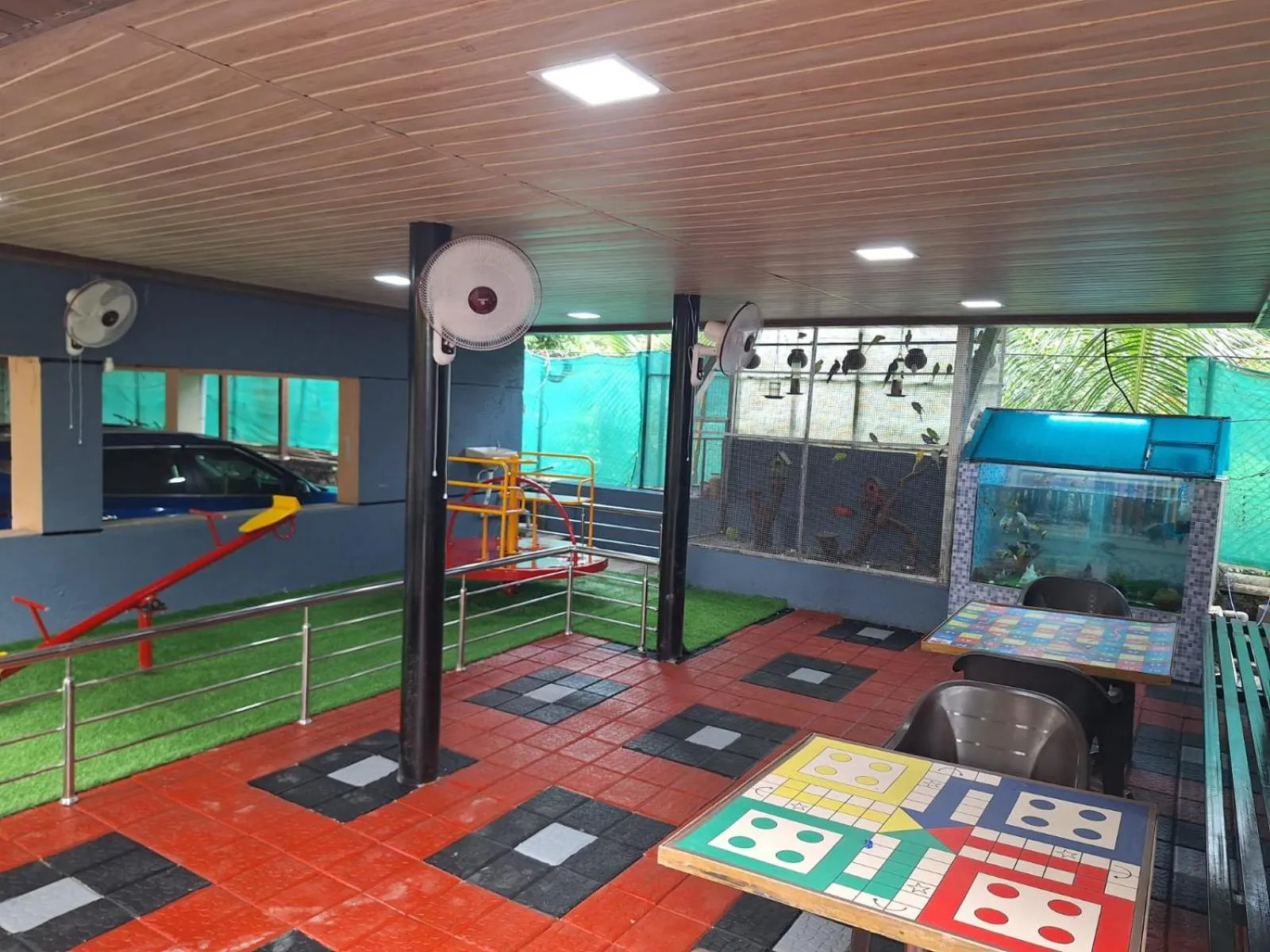 Game Room in Coastal Bay Inn by Green Apple Stays