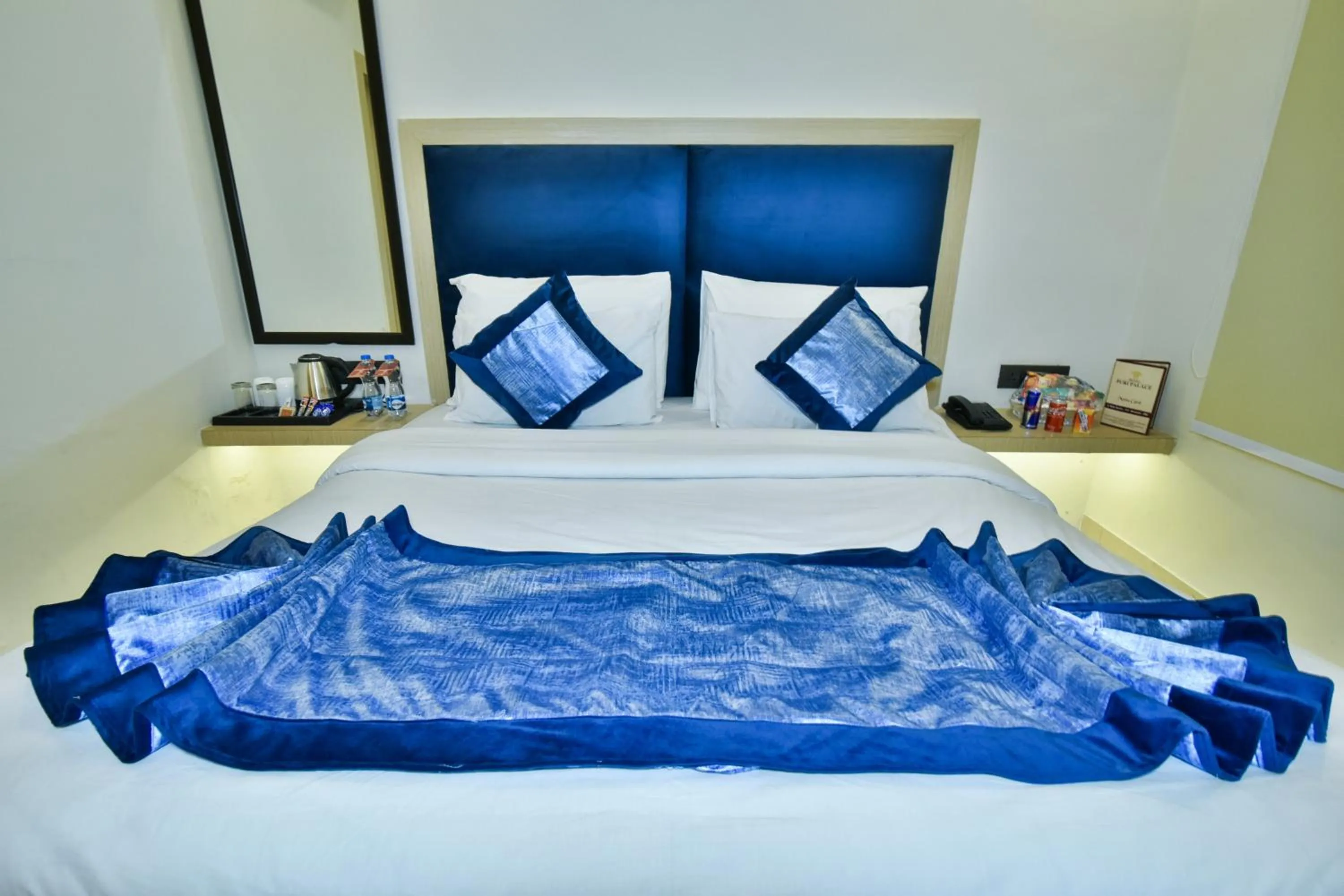 Bed in Hotel Puri Palace