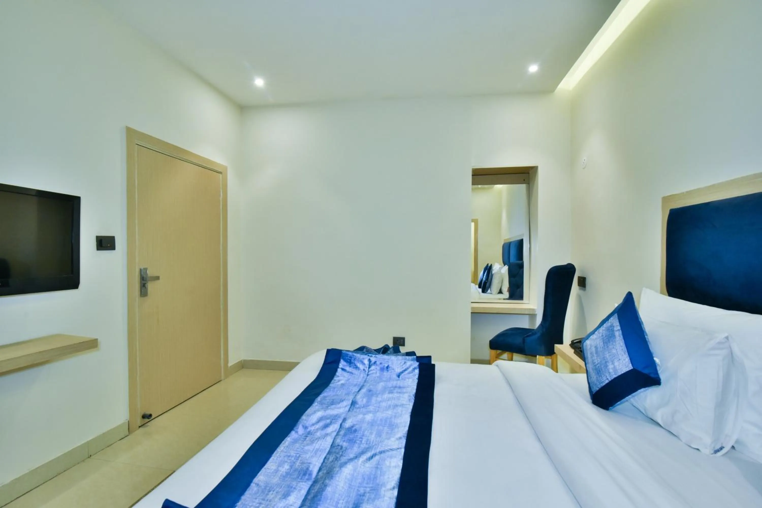 Bed in Hotel Puri Palace