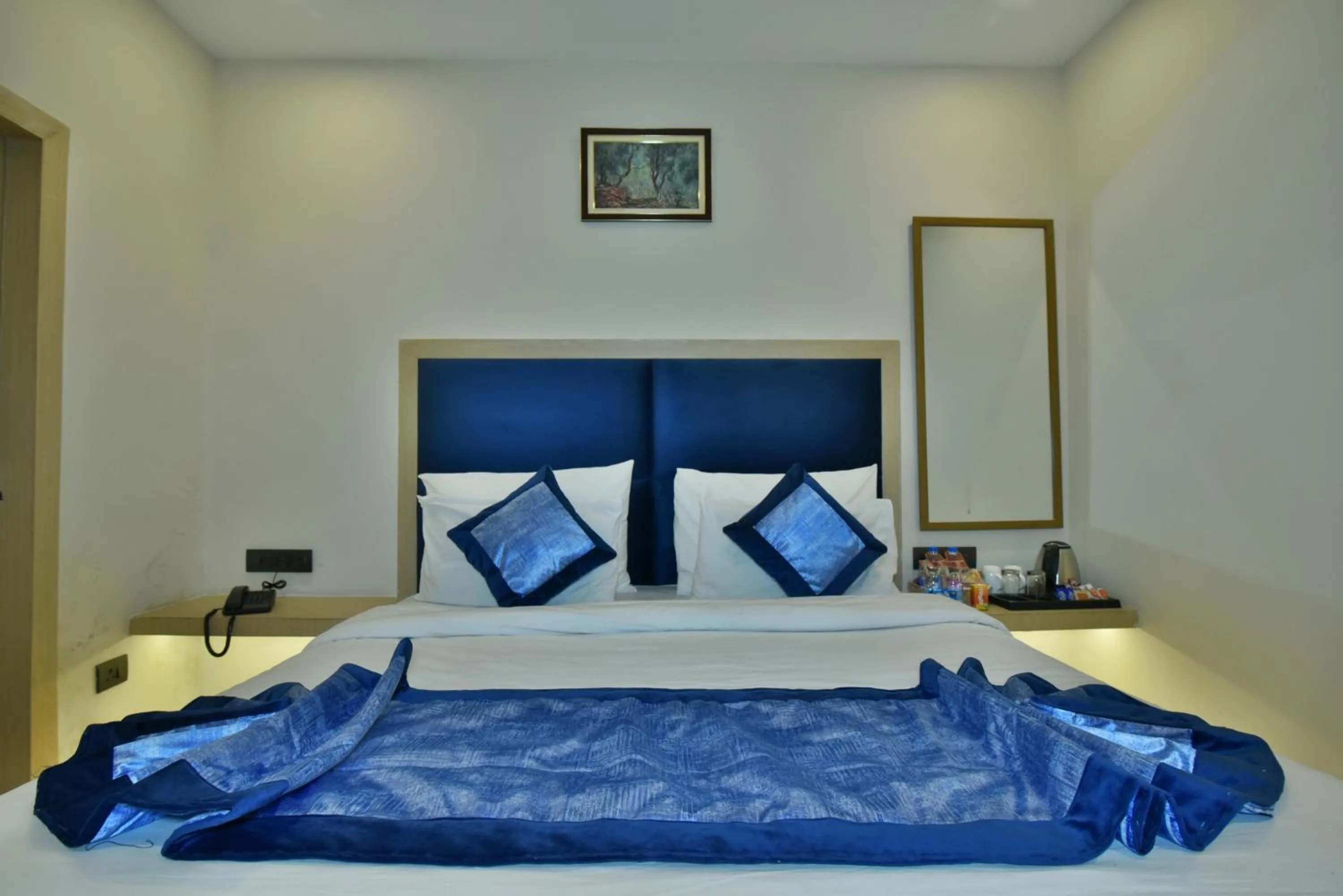 Bed in Hotel Puri Palace