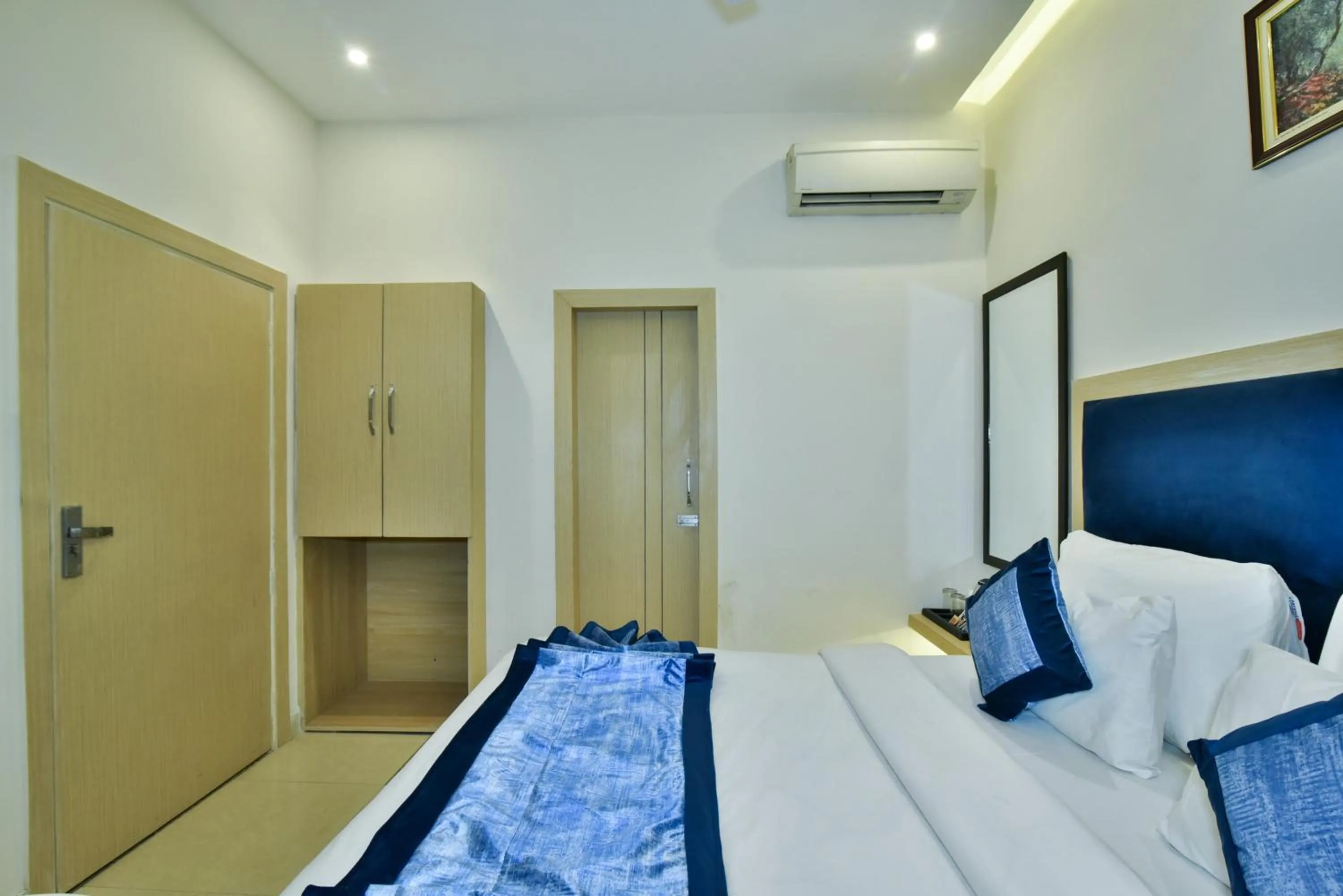 Bed in Hotel Puri Palace