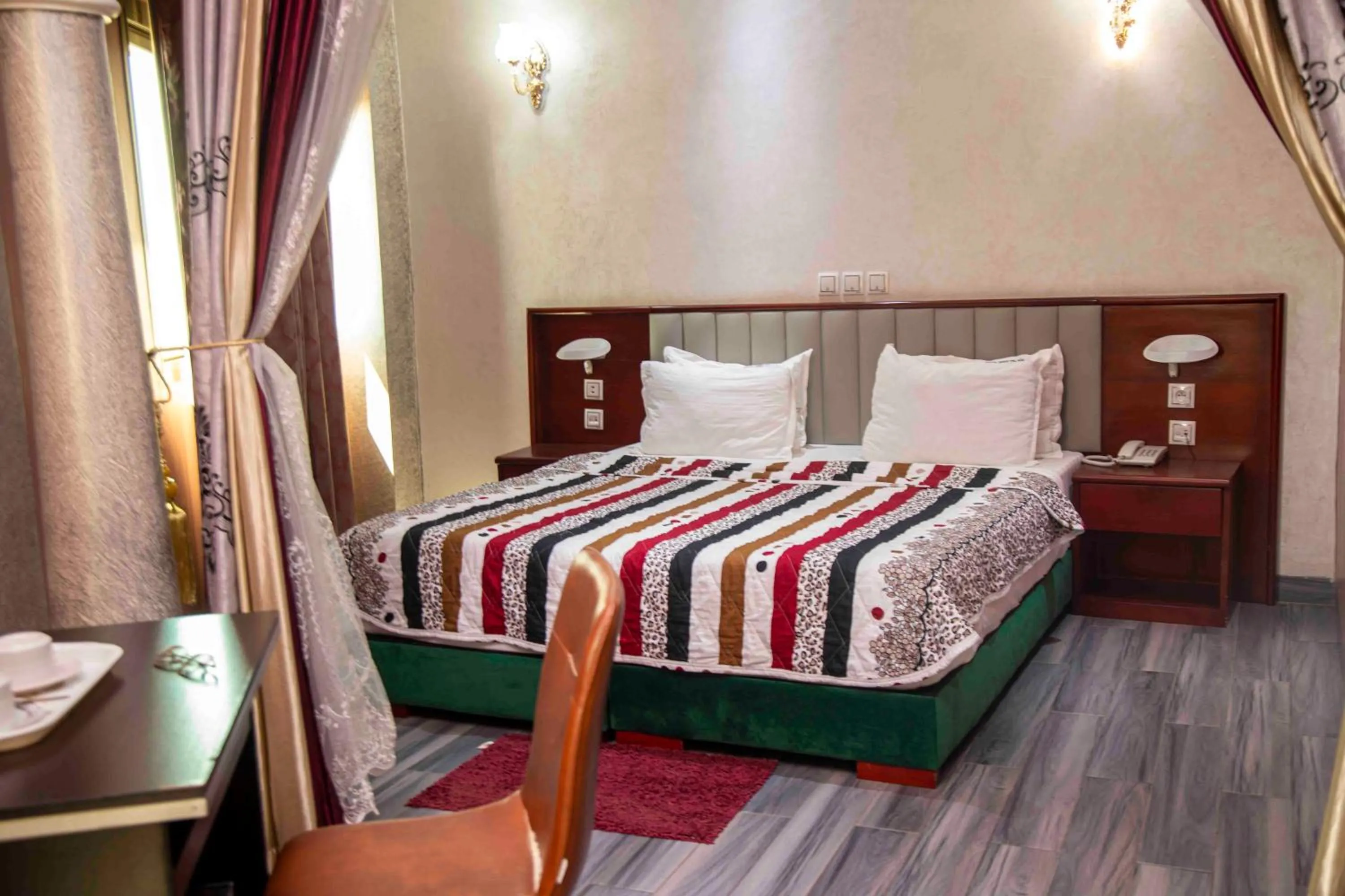 Bed in Hôtel Sindz Palace