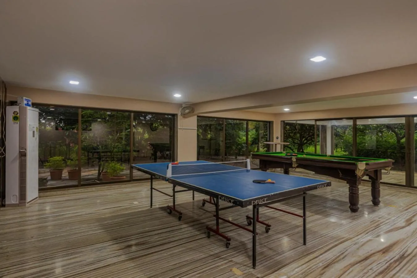 Game Room in SaffronStays Aura - 4BR luxury pool villa with gym, BBQ deck, lawns & indoor games near Kihim Beach