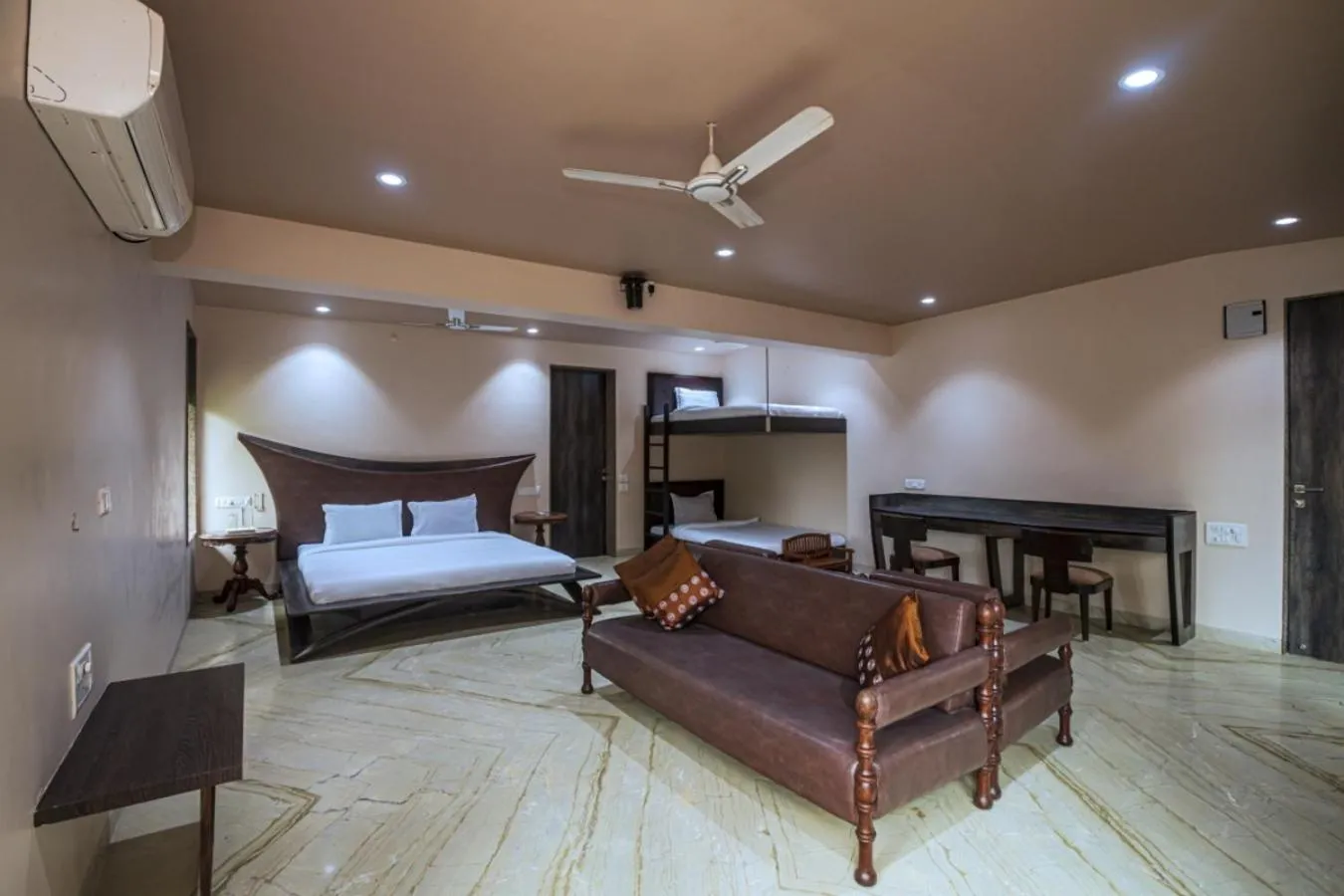 Bed in SaffronStays Aura - 4BR luxury pool villa with gym, BBQ deck, lawns & indoor games near Kihim Beach