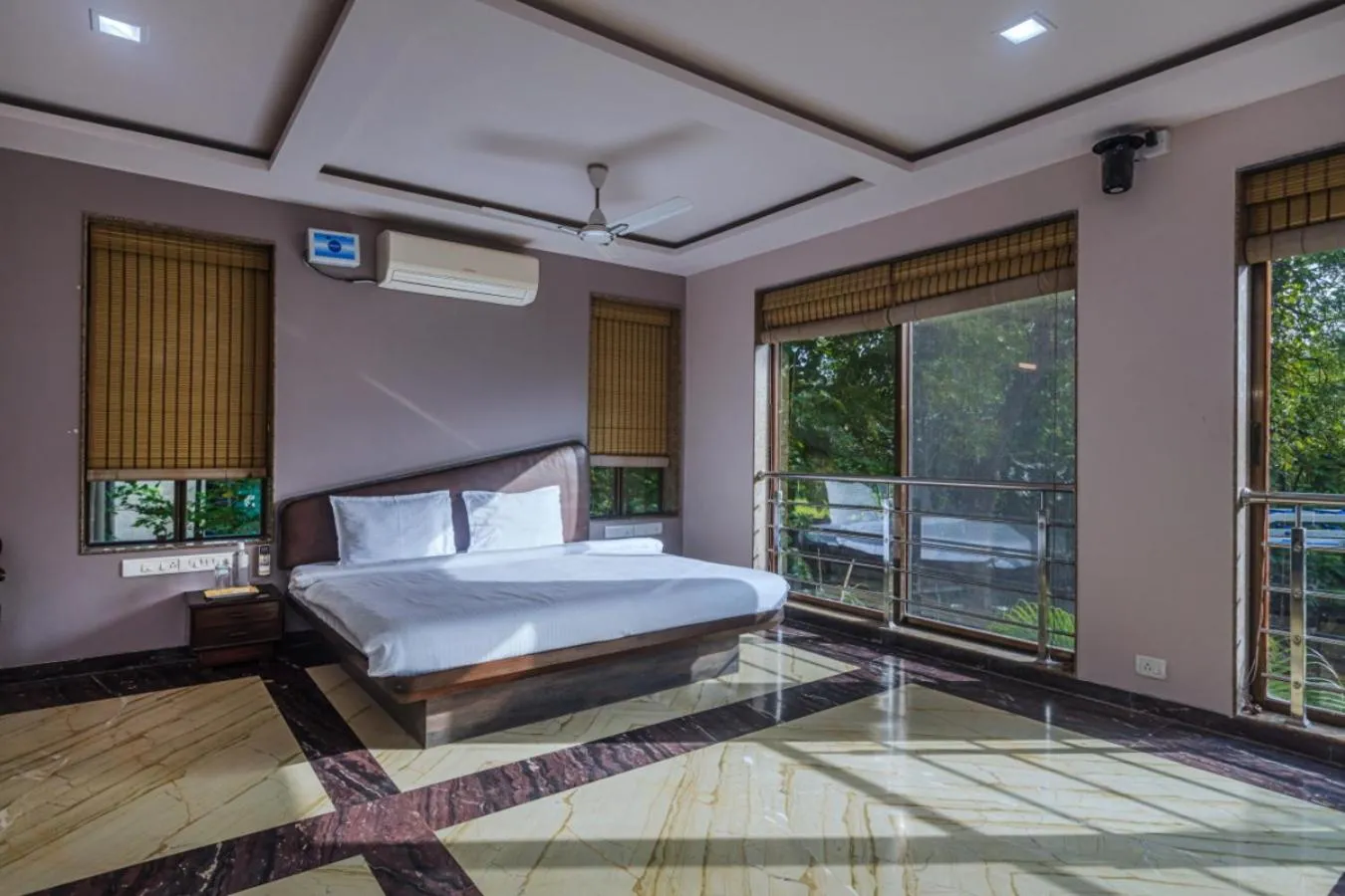 Bed in SaffronStays Aura - 4BR luxury pool villa with gym, BBQ deck, lawns & indoor games near Kihim Beach