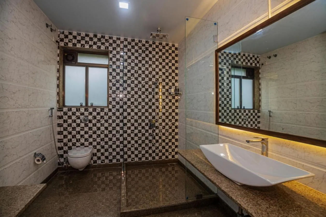 Shower in SaffronStays Aura - 4BR luxury pool villa with gym, BBQ deck, lawns & indoor games near Kihim Beach