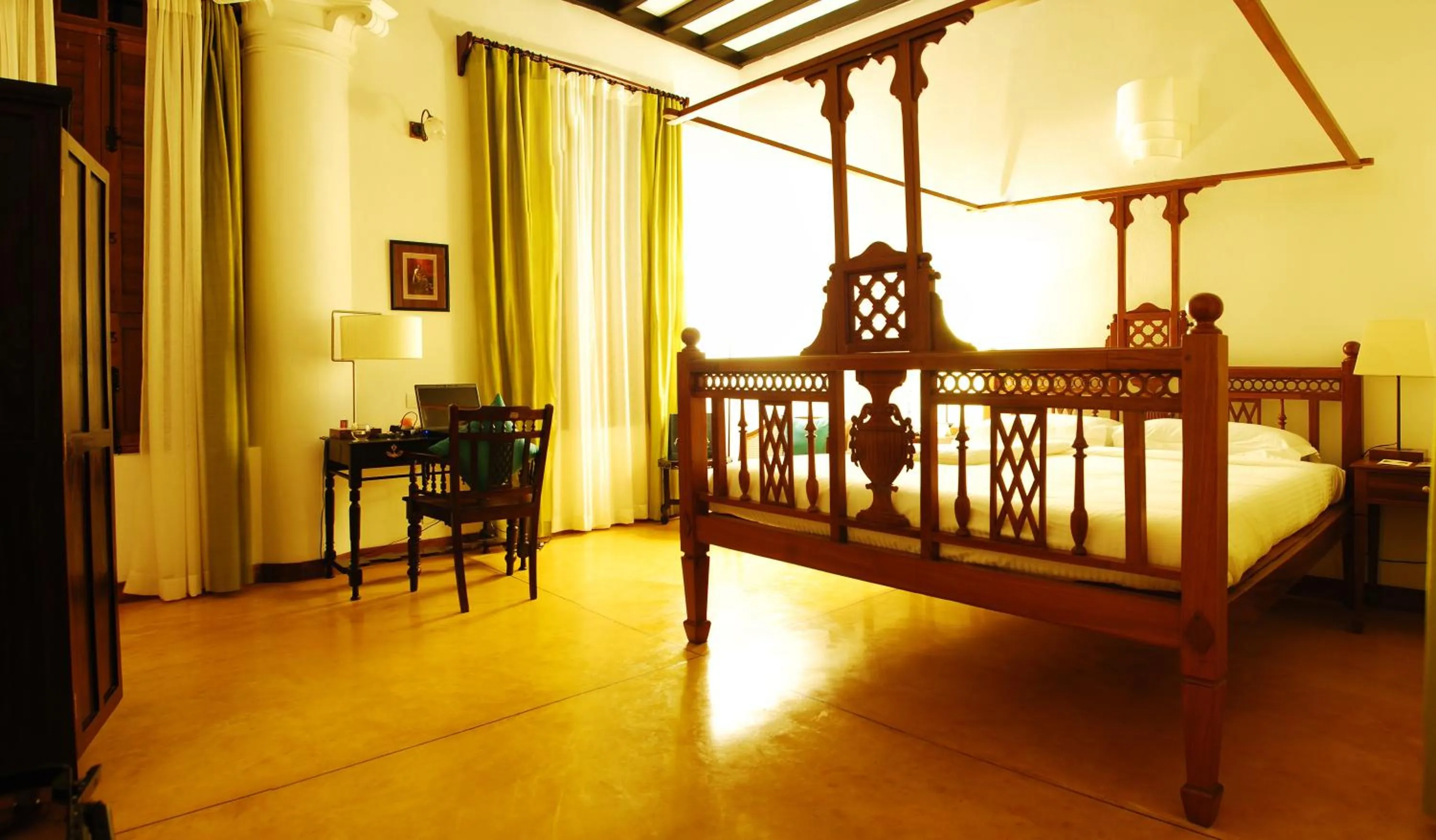 Bed in Maison Perumal Pondicherry - A CGH Earth Experience