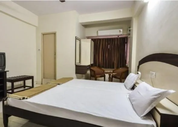 Bed in Hotel Maya Deluxe