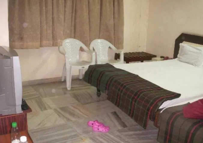 Bed in Hotel Maya Deluxe