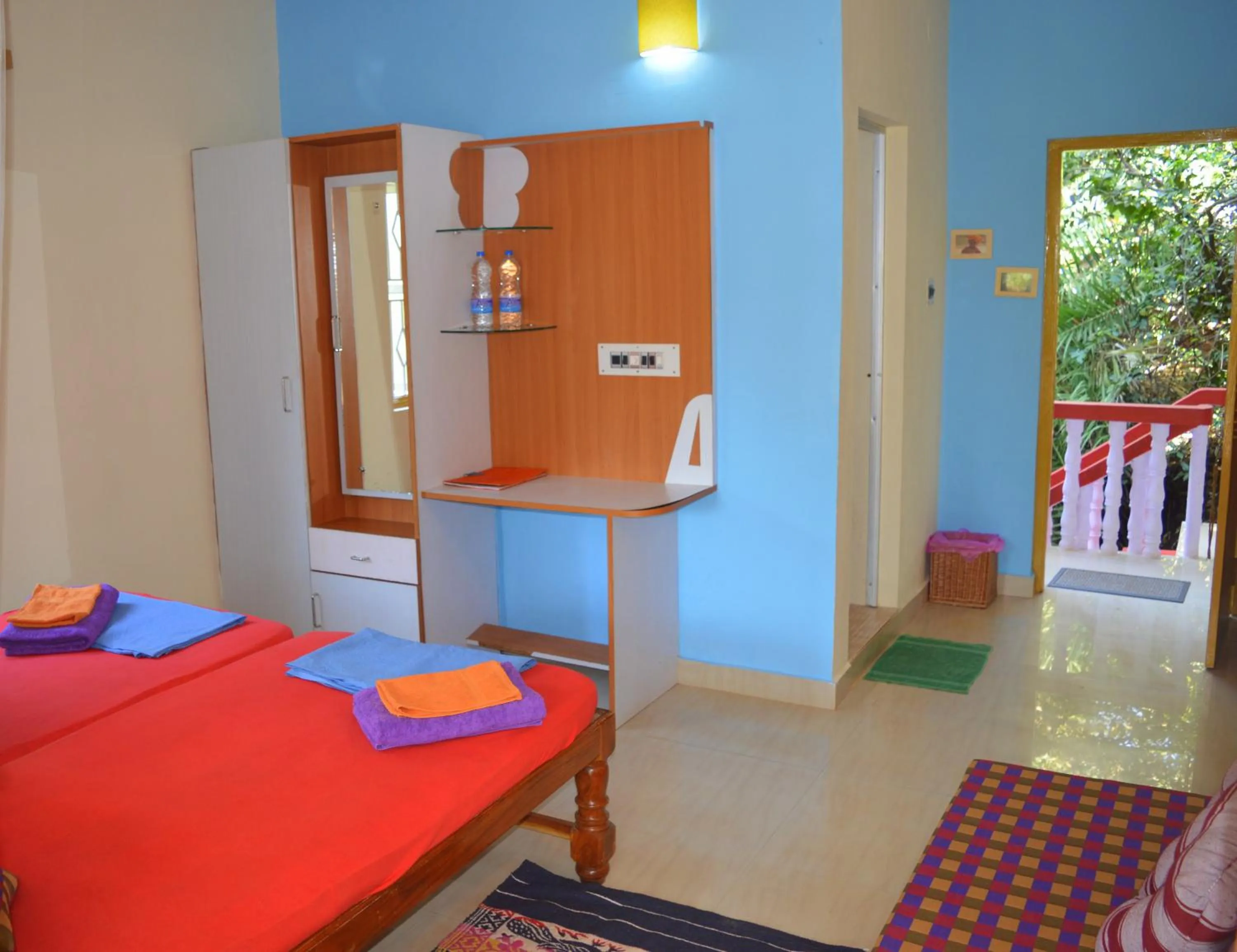 Photo of the whole room, Bed in Namaste Yoga Farm