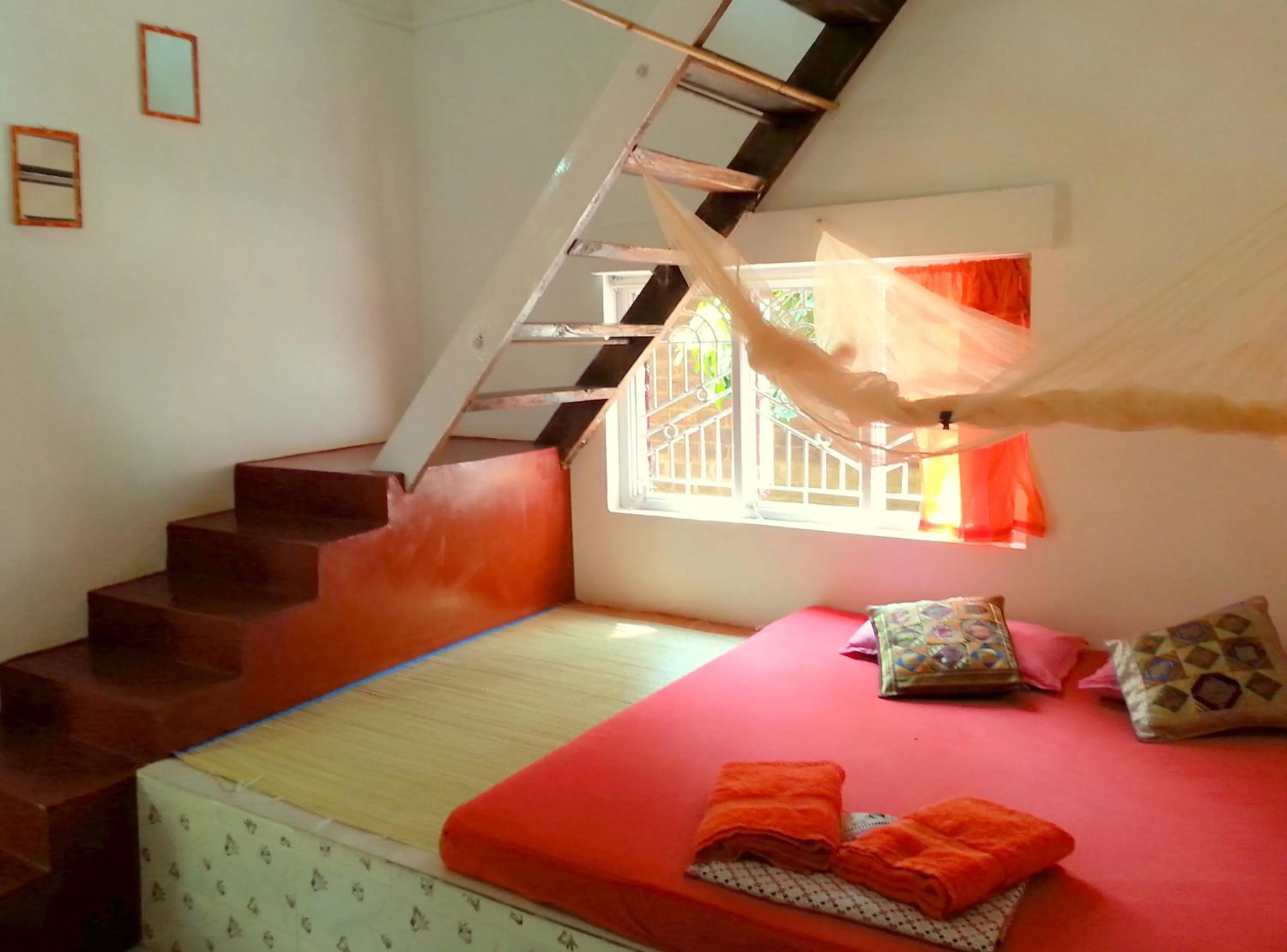 Photo of the whole room, Bed in Namaste Yoga Farm