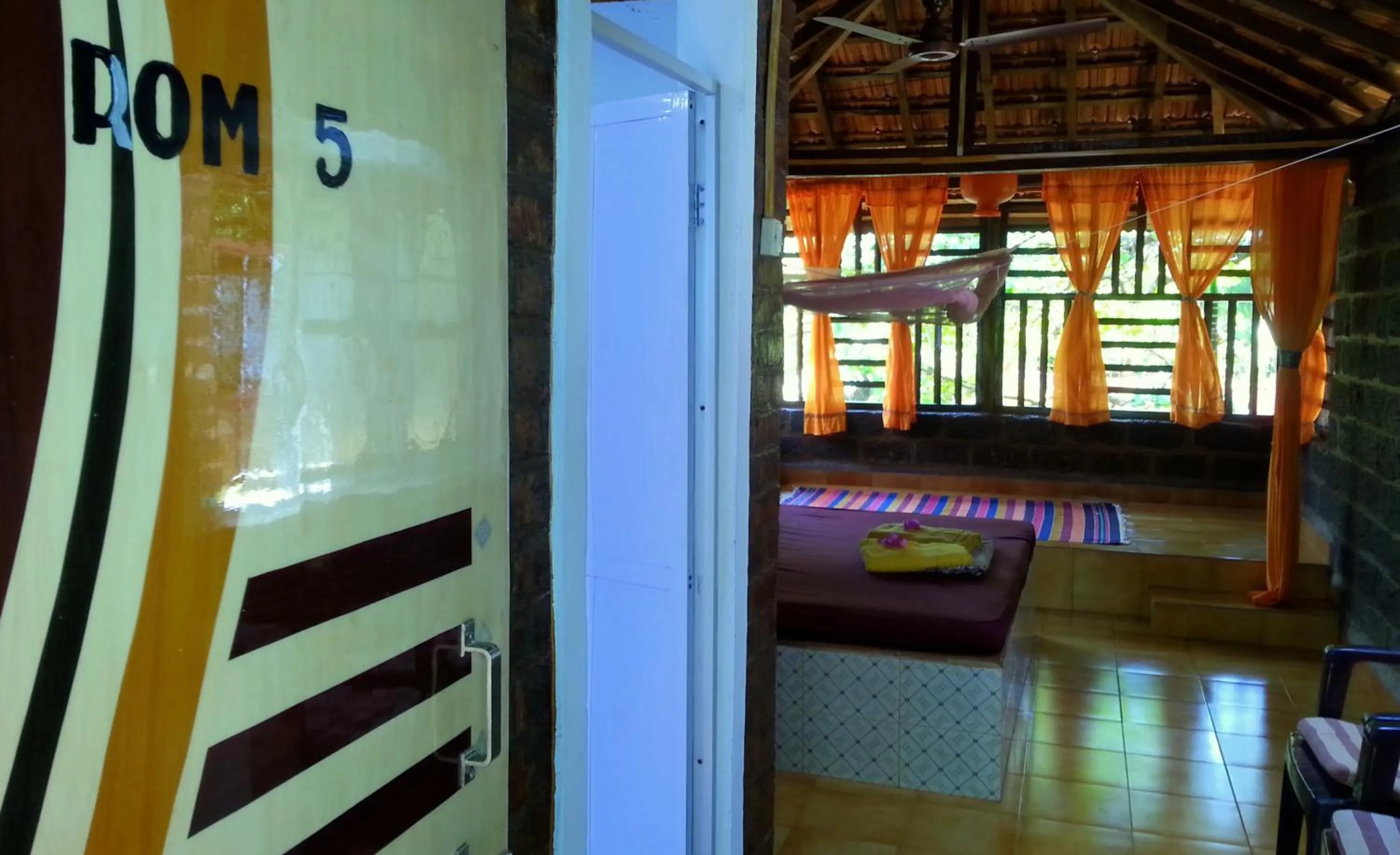 Photo of the whole room, Bed in Namaste Yoga Farm