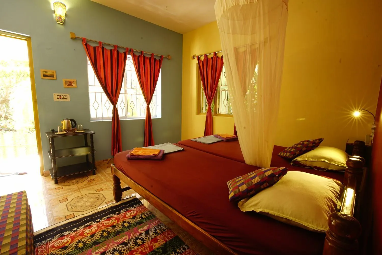 Photo of the whole room, Bed in Namaste Yoga Farm