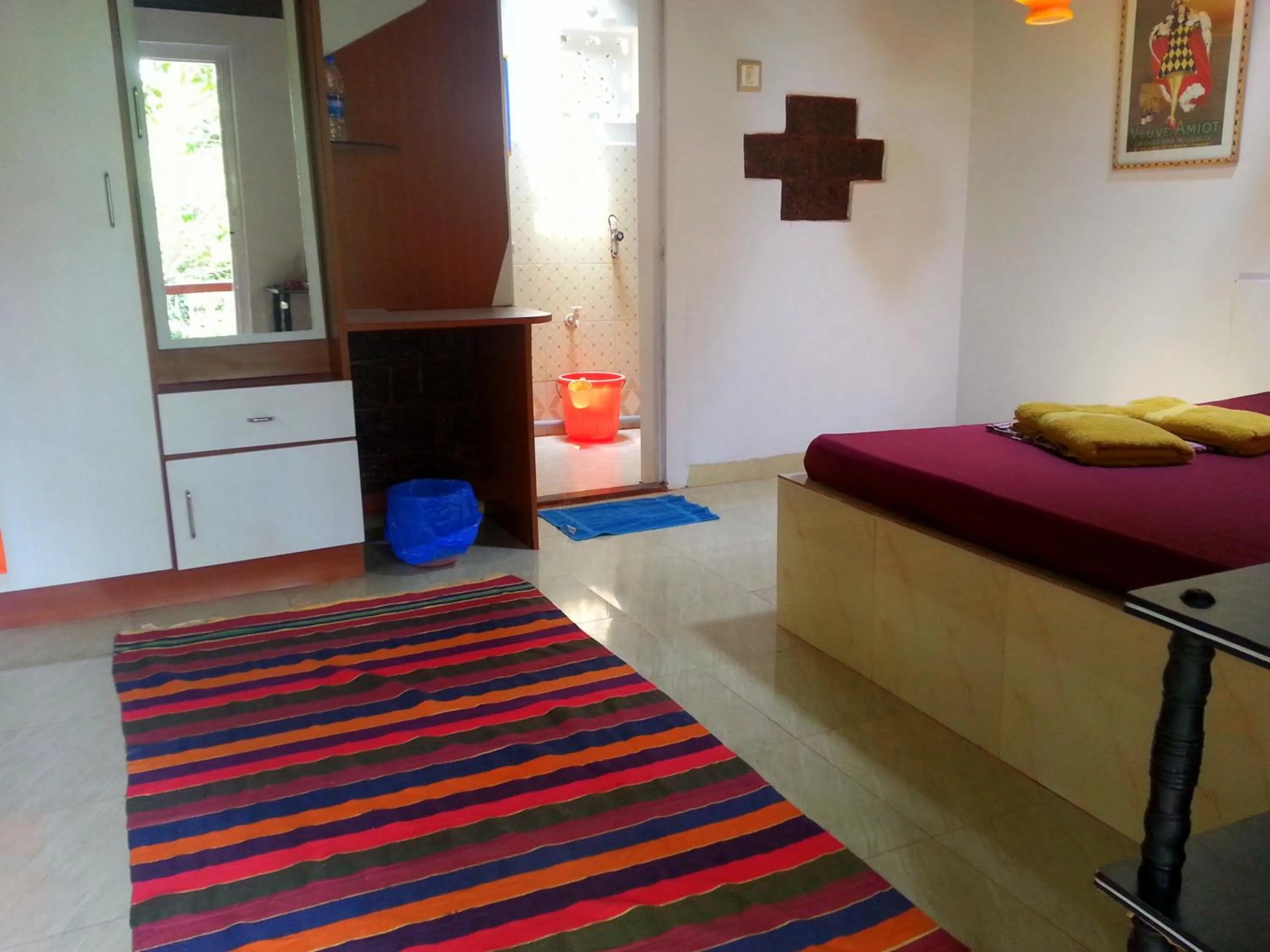 Photo of the whole room, Bed in Namaste Yoga Farm