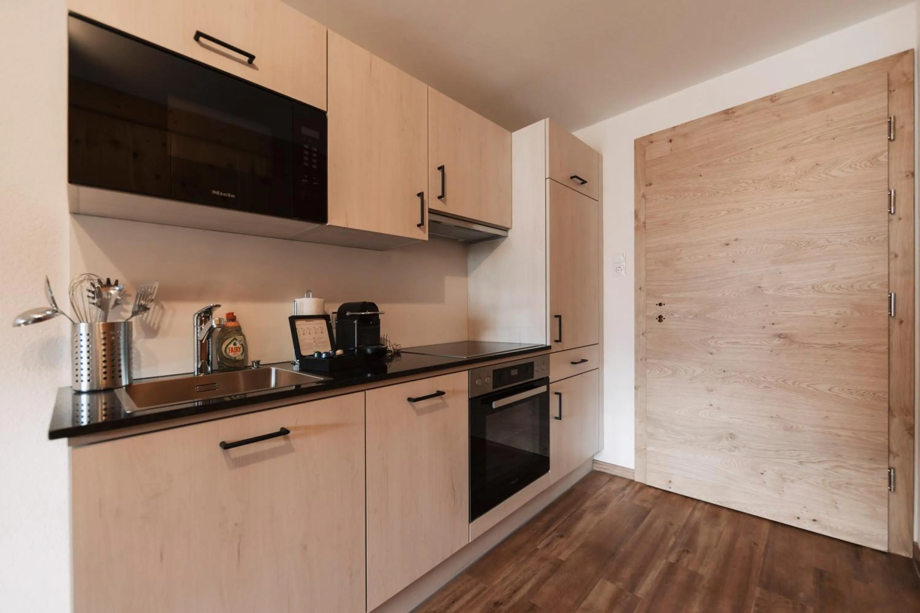 Kitchen or kitchenette in Wellness Aparthotel Panorama Alpin - Ferienwohnungen Jerzens im Pitztal