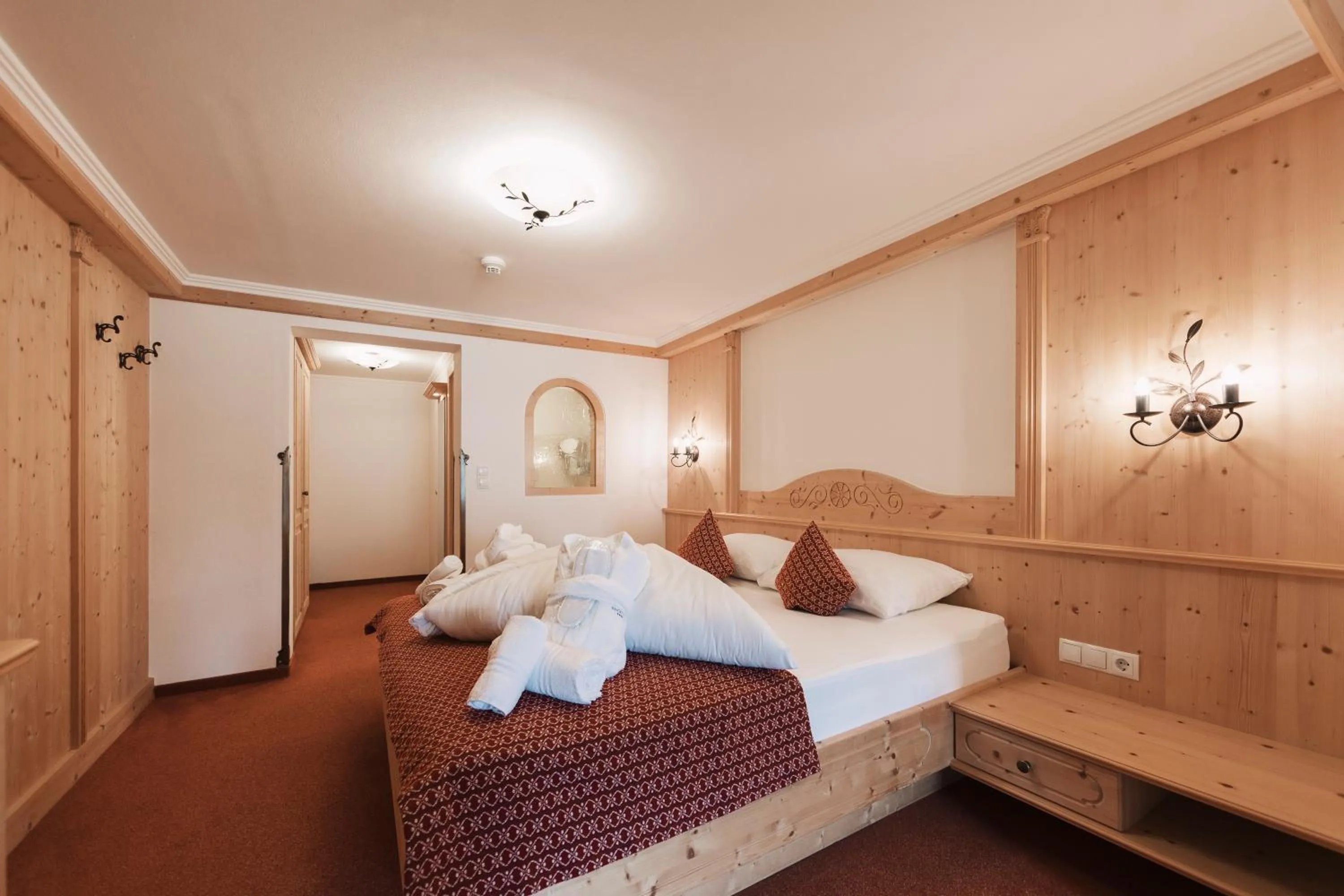 Bedroom, Bed in Wellness Aparthotel Panorama Alpin - Ferienwohnungen Jerzens im Pitztal