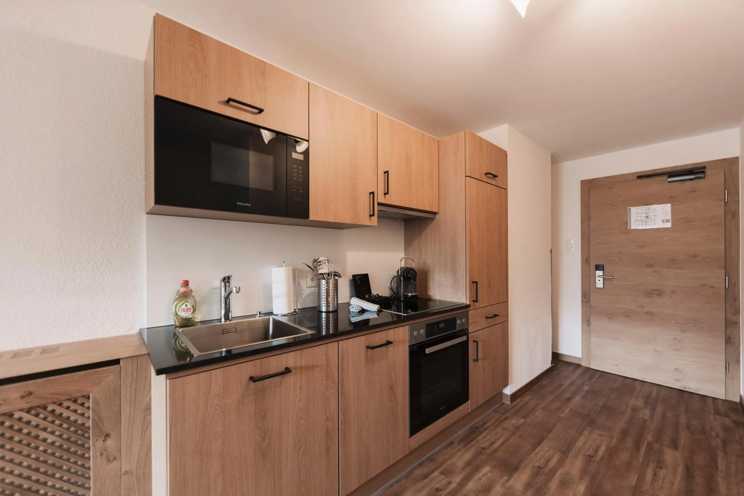 Kitchen or kitchenette in Wellness Aparthotel Panorama Alpin - Ferienwohnungen Jerzens im Pitztal