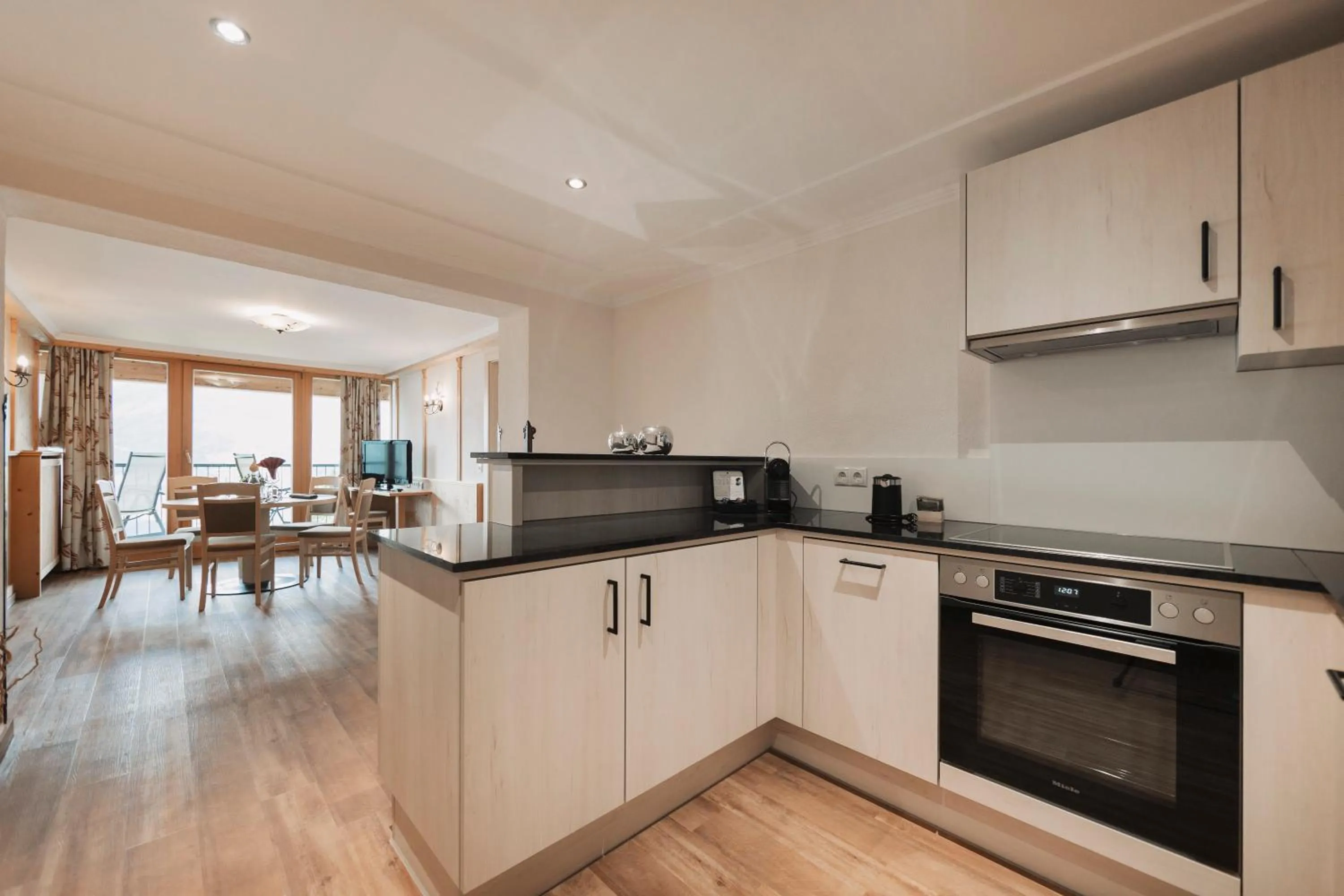 Kitchen or kitchenette in Wellness Aparthotel Panorama Alpin - Ferienwohnungen Jerzens im Pitztal