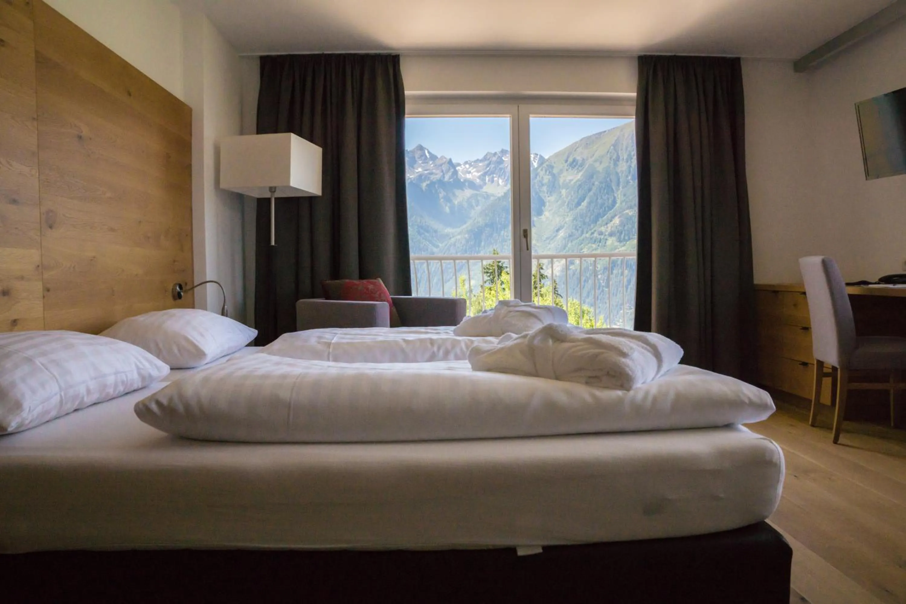 Bed in Wellness Aparthotel Panorama Alpin - Ferienwohnungen Jerzens im Pitztal