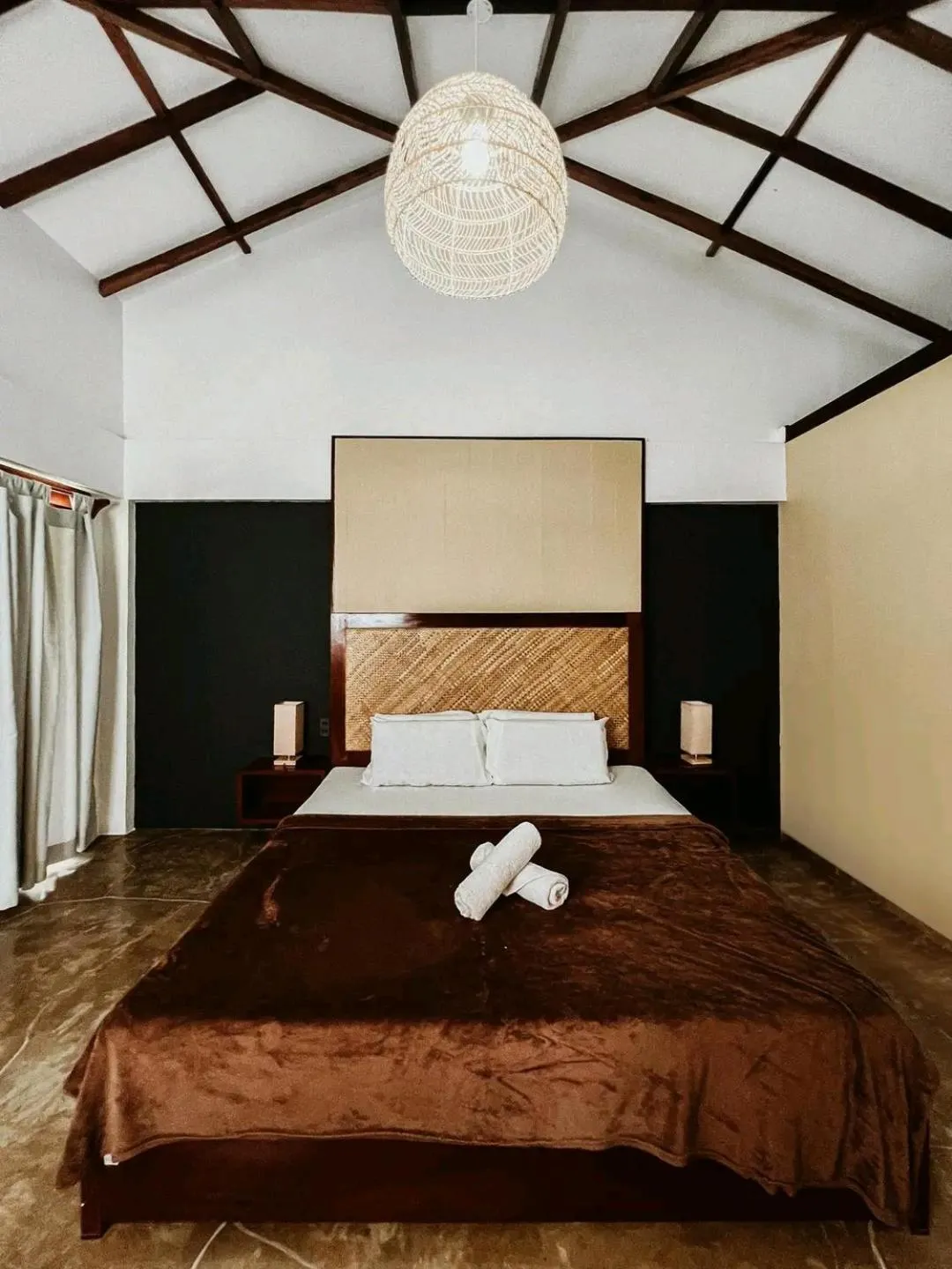 Bed in Lagkaw Siargao Villas
