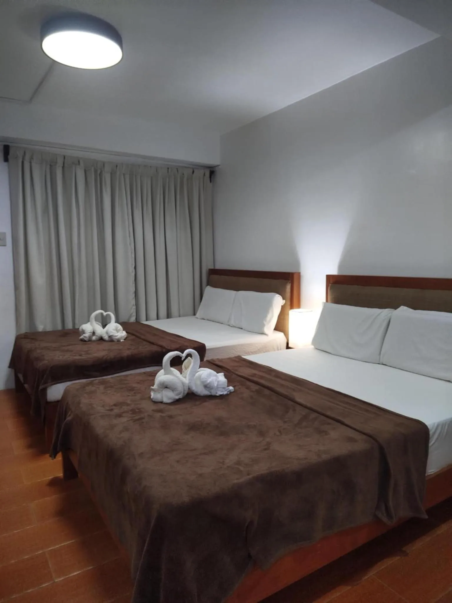 Bed in Lagkaw Siargao Villas