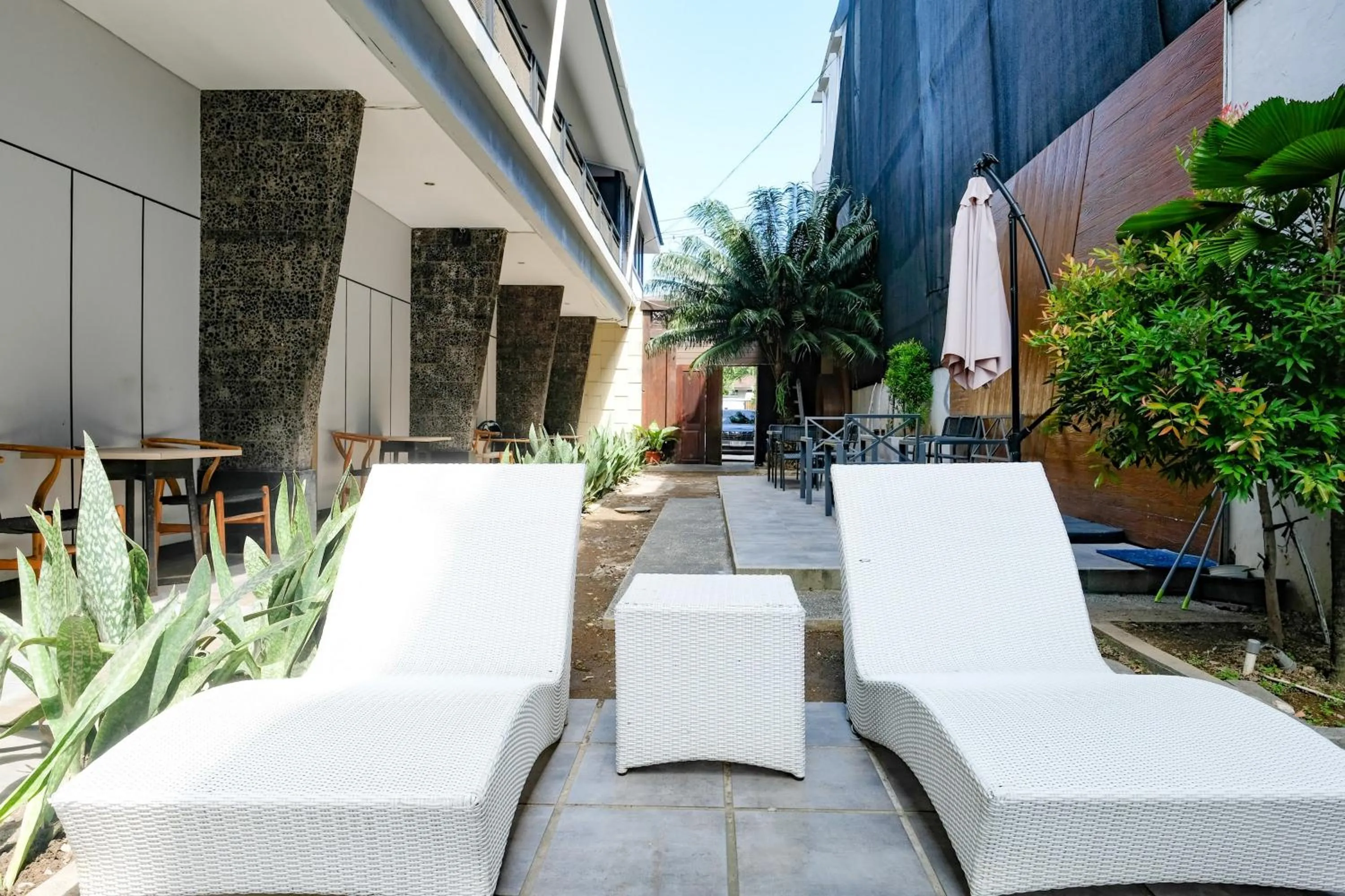 Seating area in Lega Legi Town House Seminyak by The Lavana