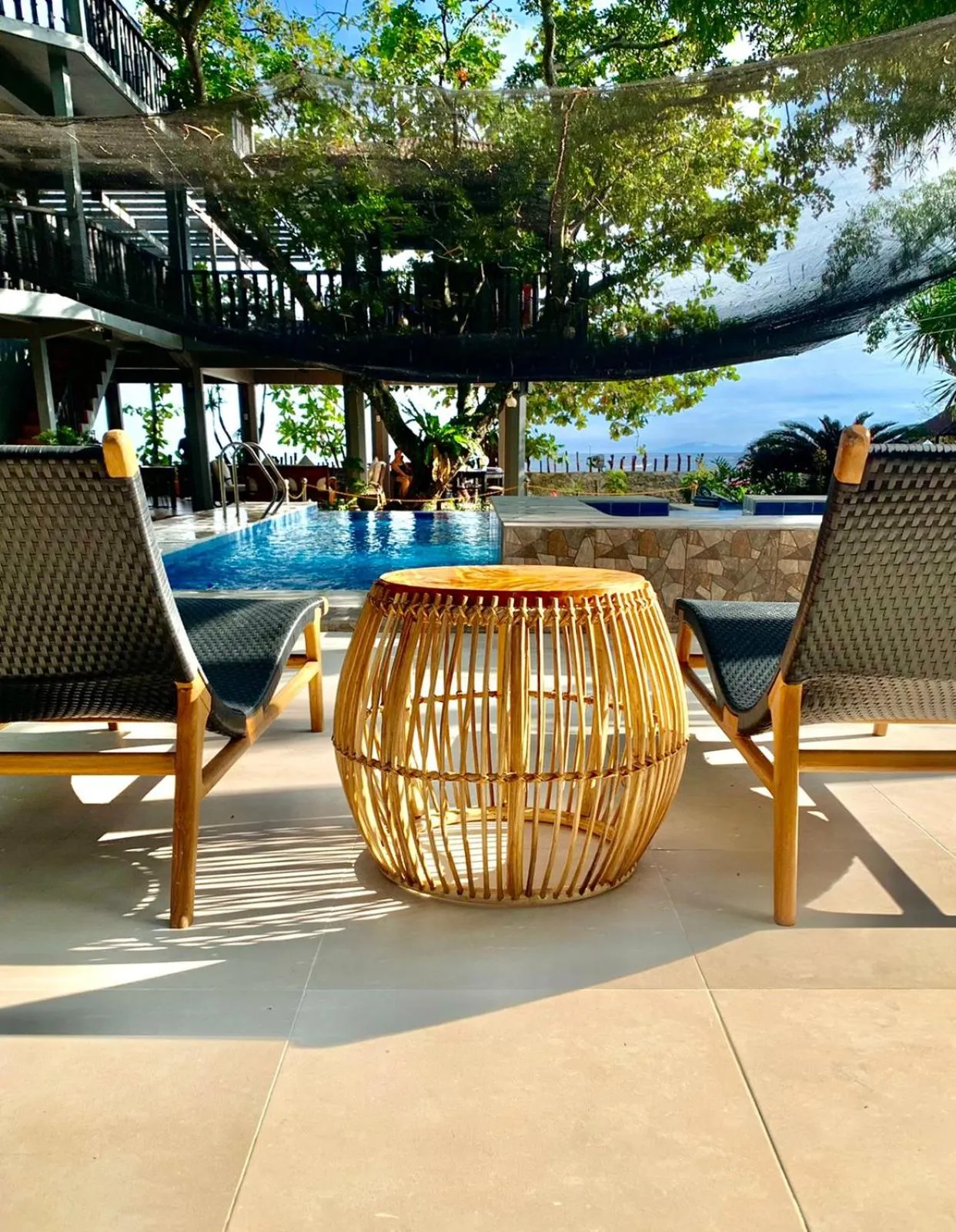 Swimming pool in The Henry Resort Taramindu Laiya